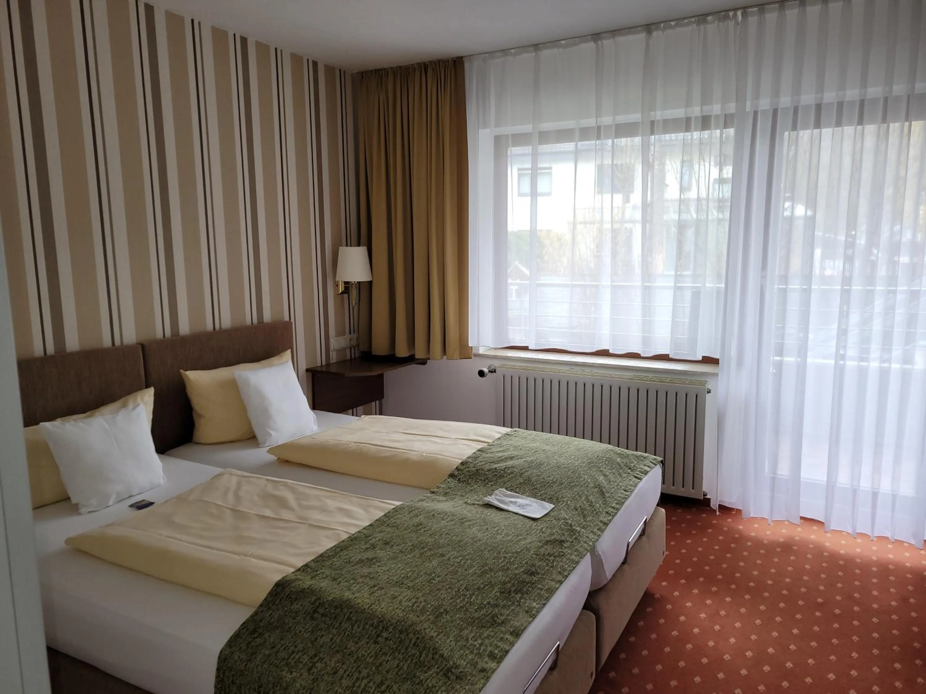 Photo of the whole room, Bed in Kurparkhotel-Gemünd