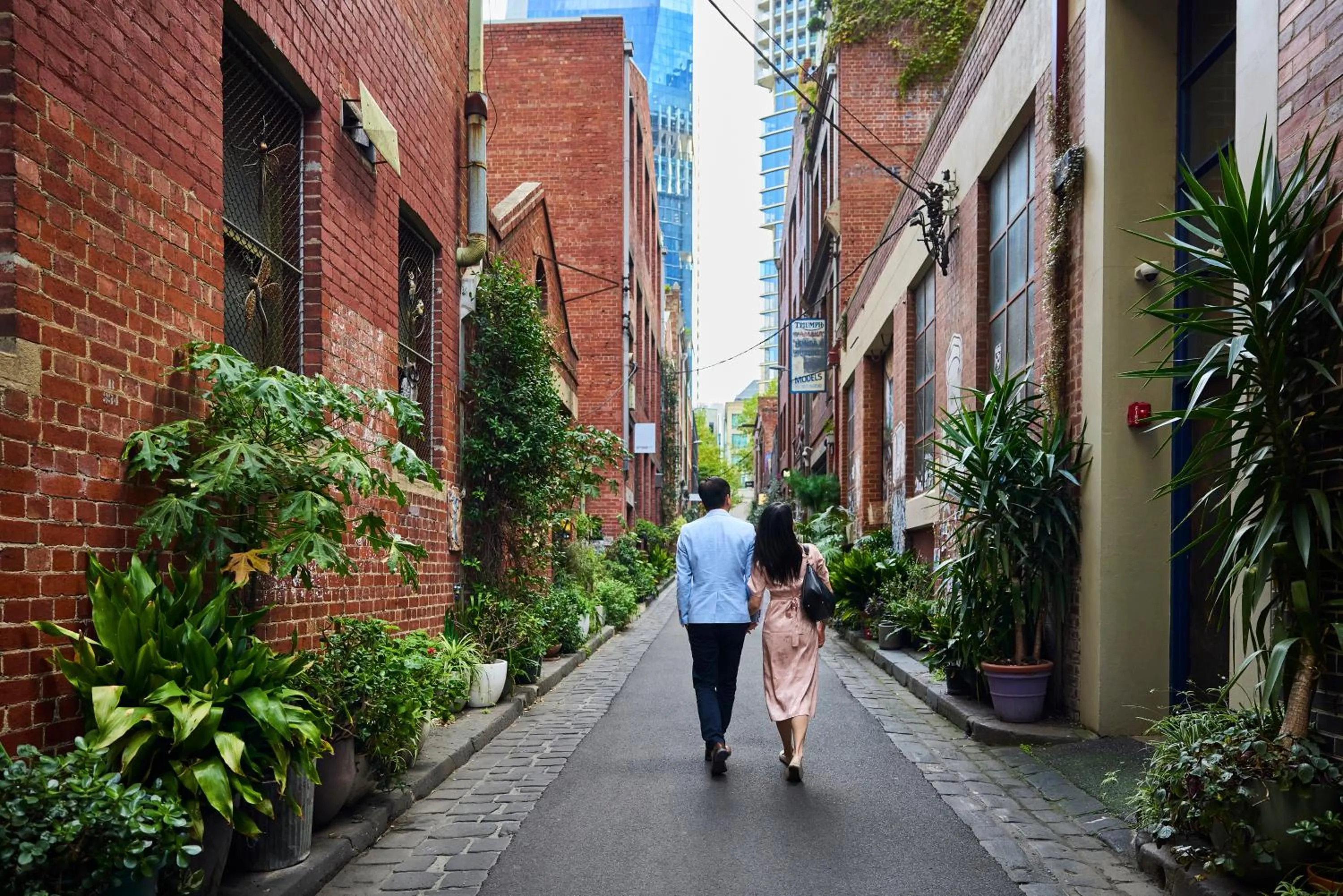 People in Brady Apartment Hotel Hardware Lane