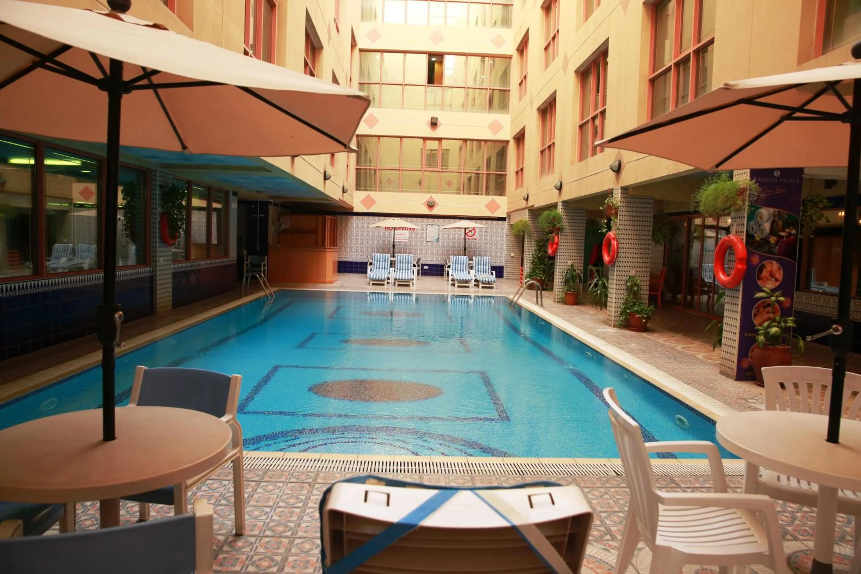 Swimming pool in Swiss International Palace Hotel Manama