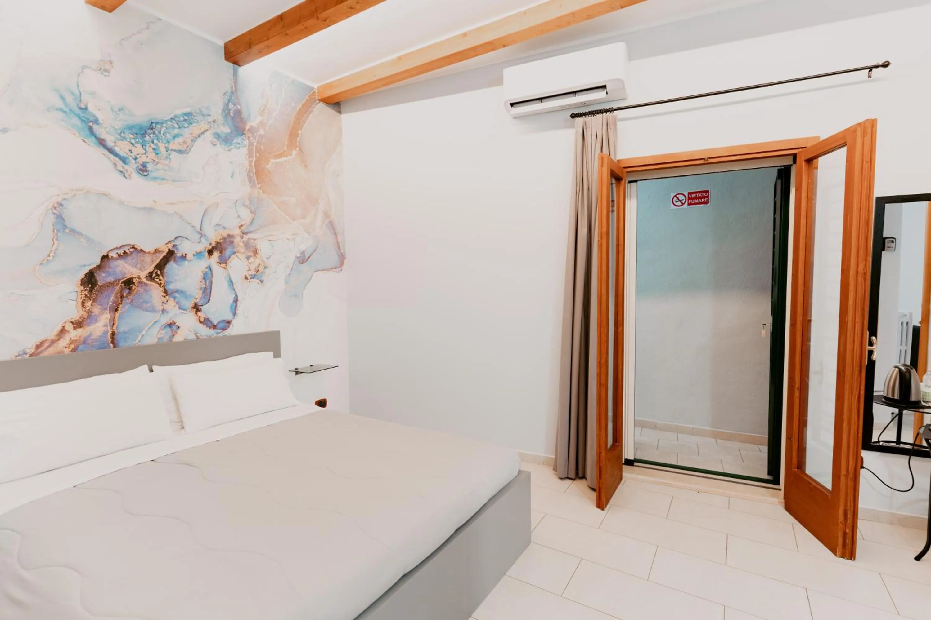 Photo of the whole room, Bed in Dimora L'Etual