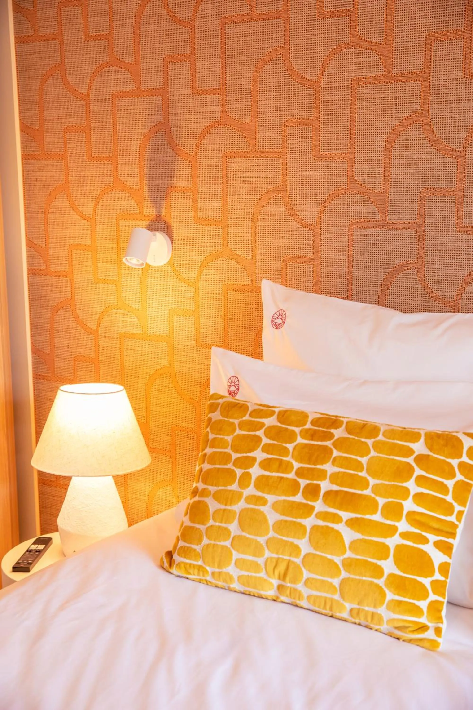 Bed in Hôtel La Ménado