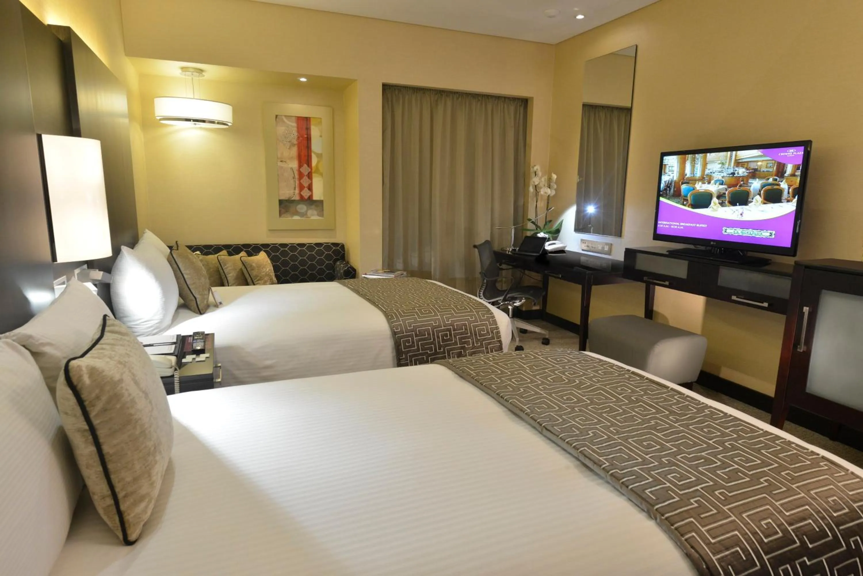 Photo of the whole room, Bed in Crowne Plaza Bahrain by IHG