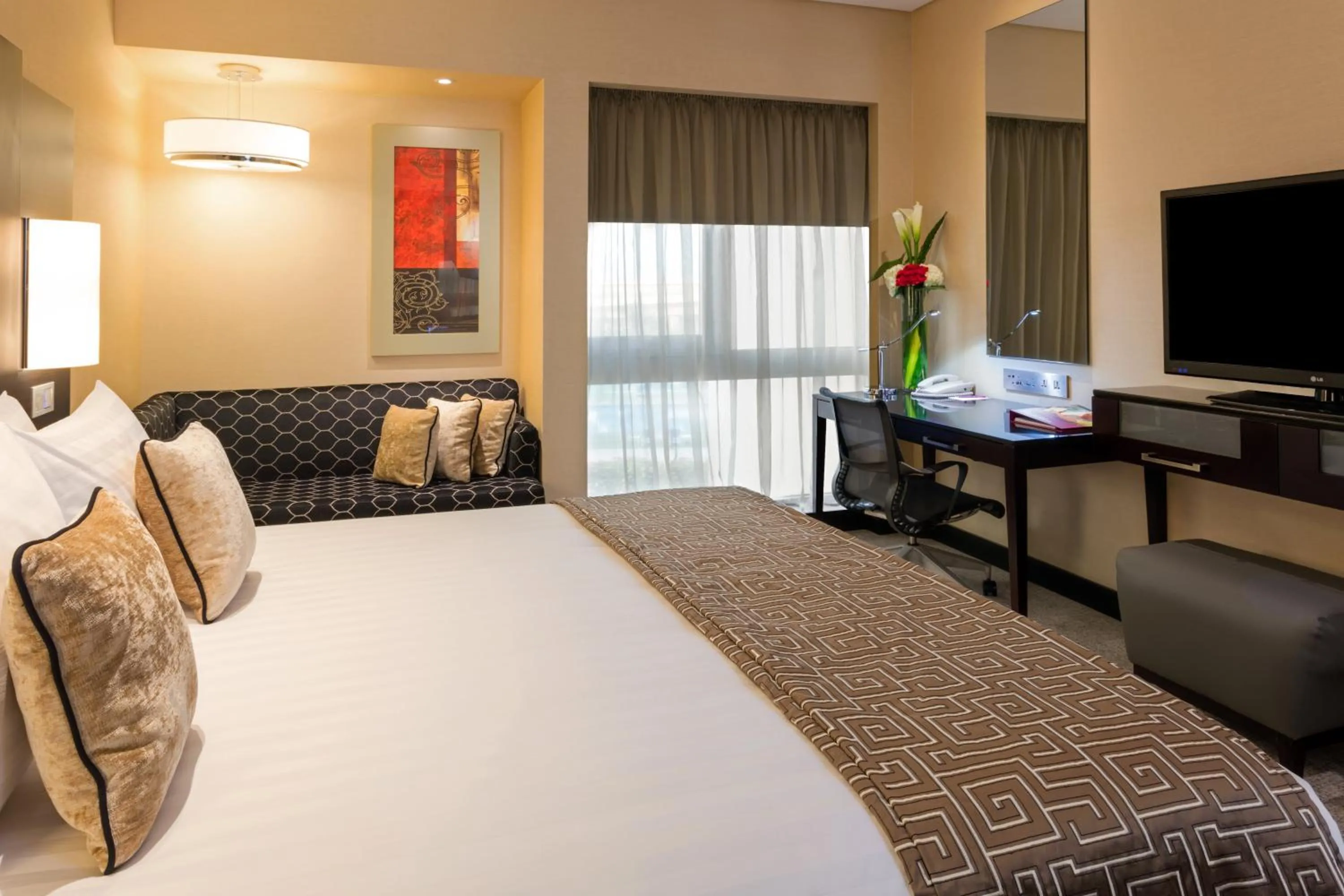 Photo of the whole room, Bed in Crowne Plaza Bahrain by IHG