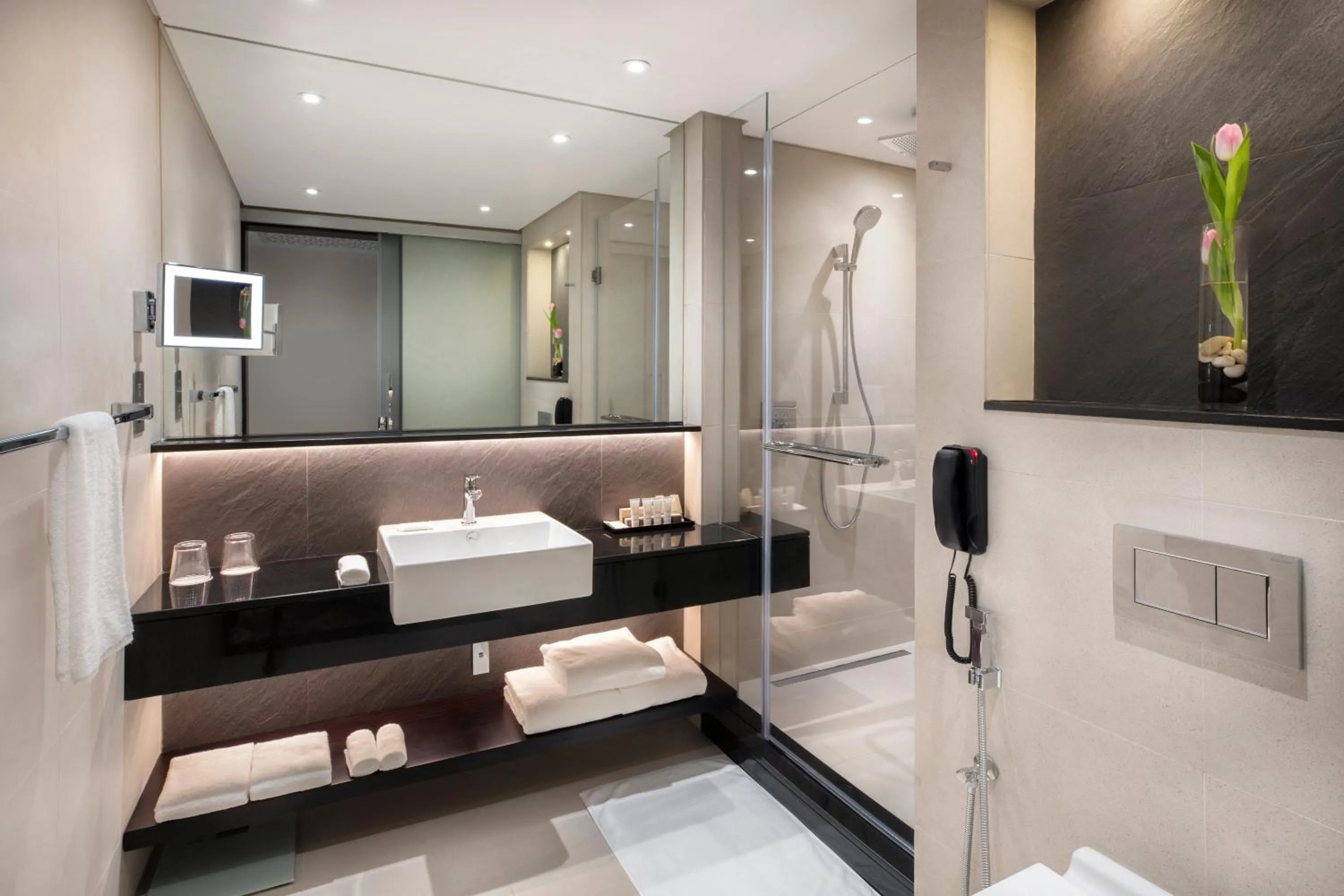 Bathroom in Crowne Plaza Bahrain by IHG