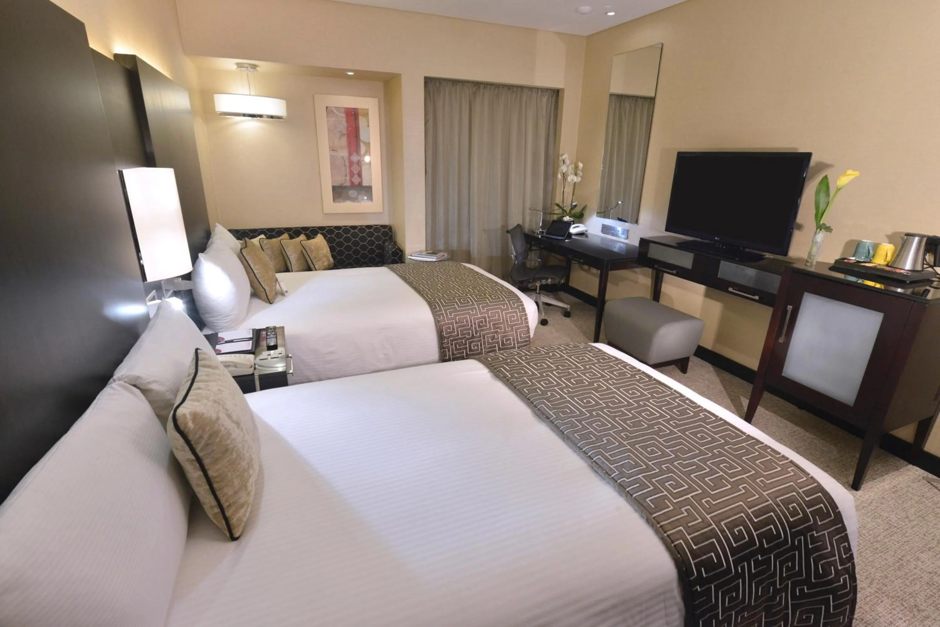 Photo of the whole room, Bed in Crowne Plaza Bahrain by IHG