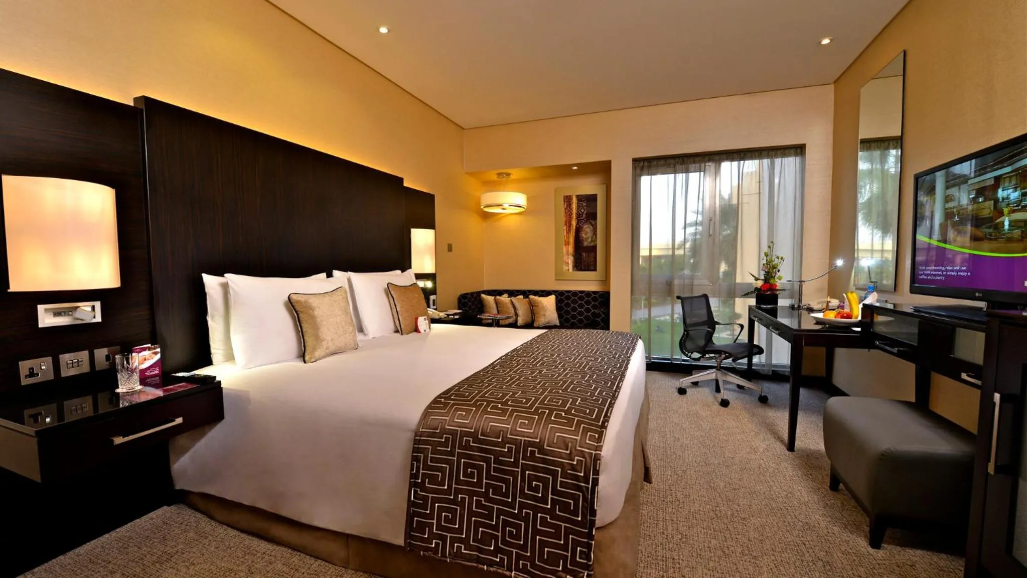 Photo of the whole room, Bed in Crowne Plaza Bahrain by IHG