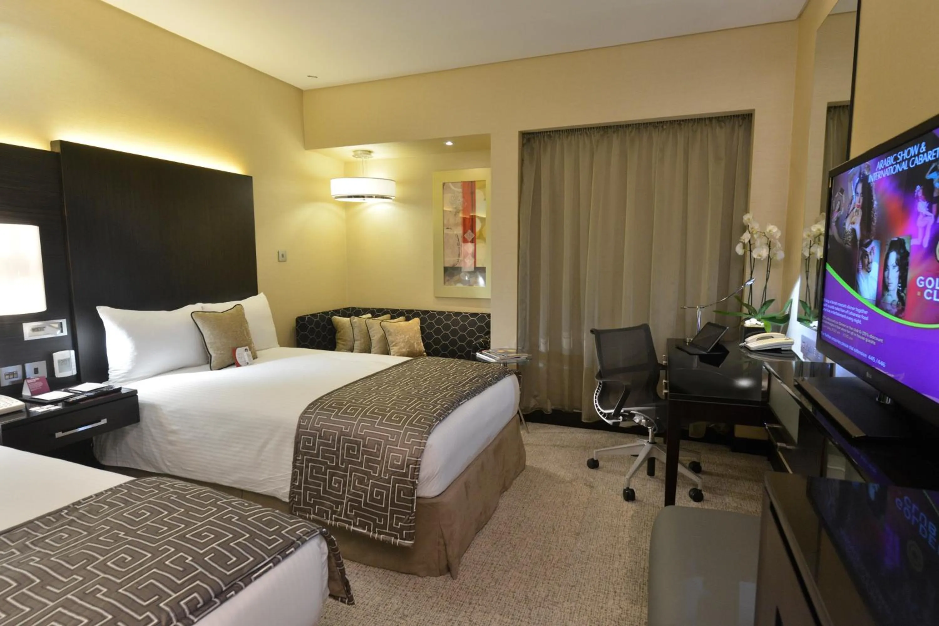 Photo of the whole room, Bed in Crowne Plaza Bahrain by IHG