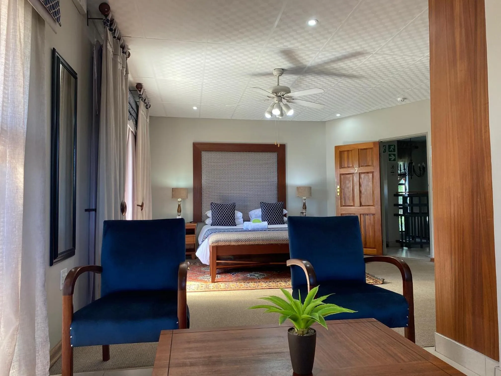 Seating area, Bed in Castello Guest House, Bloemfontein