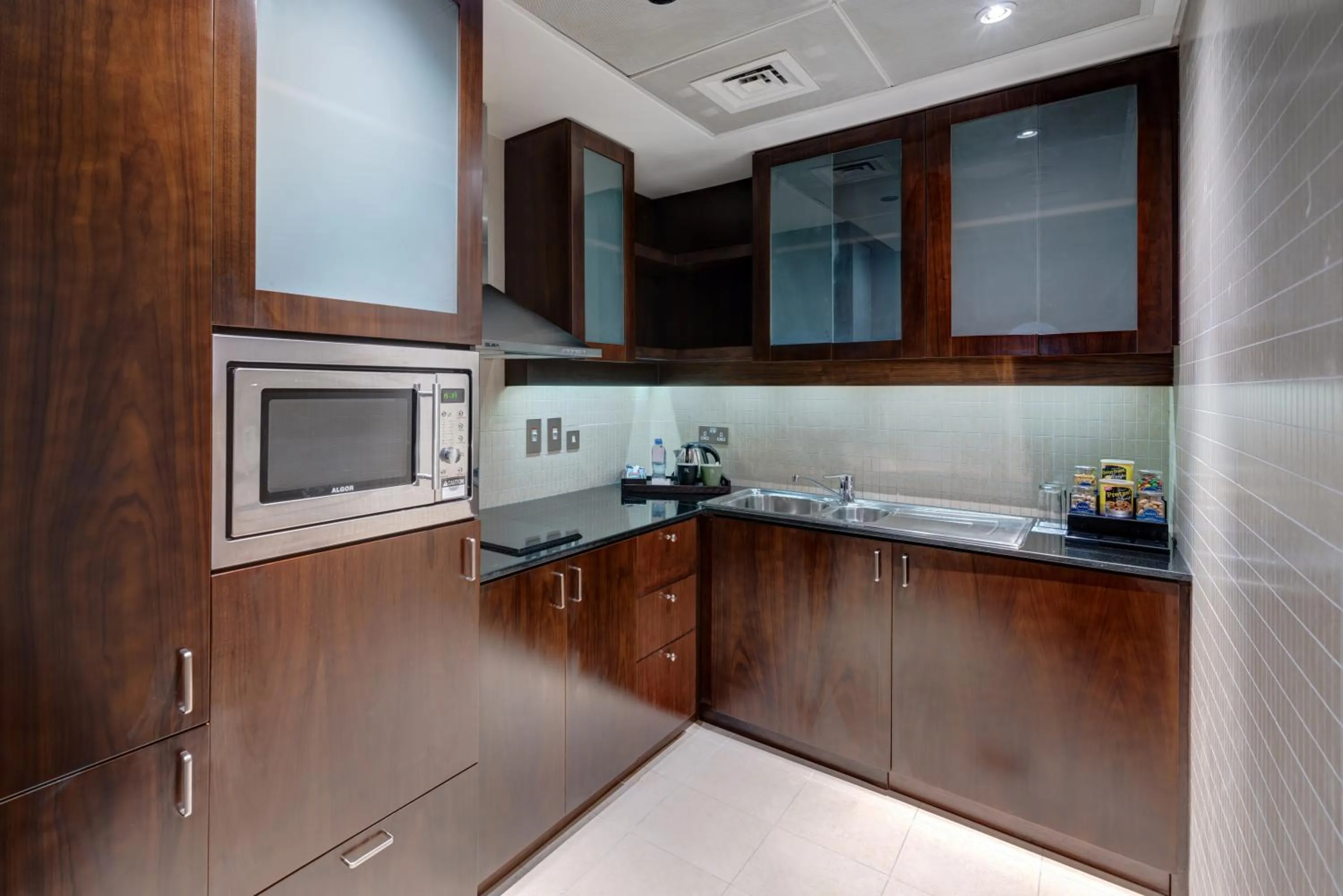 Kitchen or kitchenette in Rose Rayhaan by Rotana - Dubai