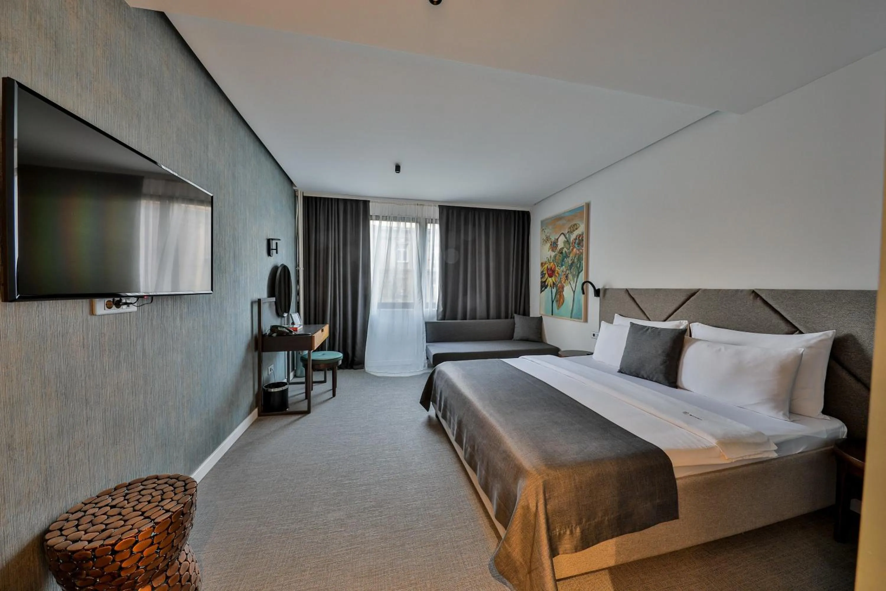 Seating area, Bed in Hotel Botanica