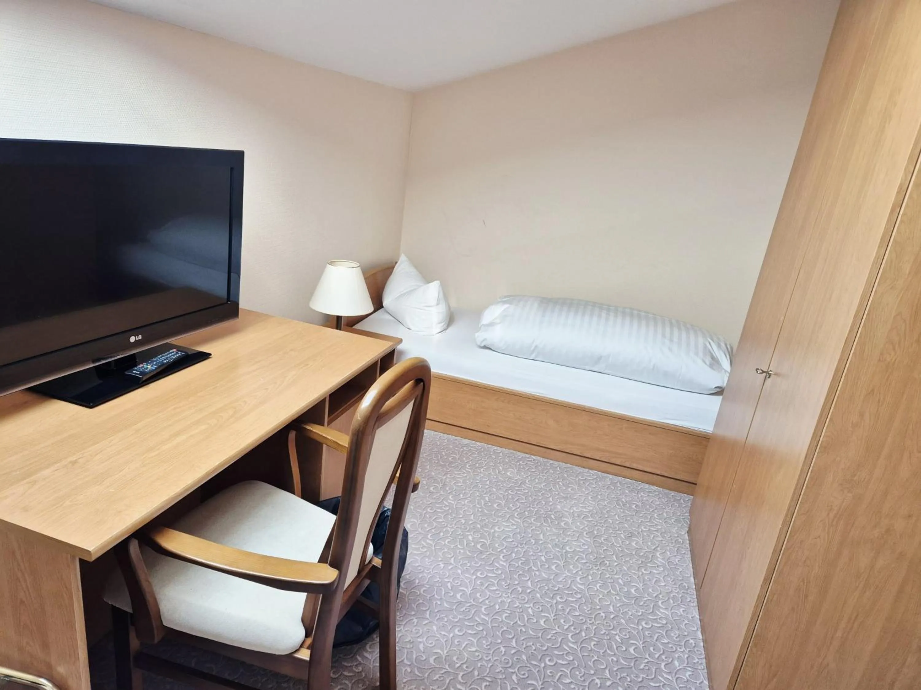 Bed in Hotel Hahnenkleer Hof