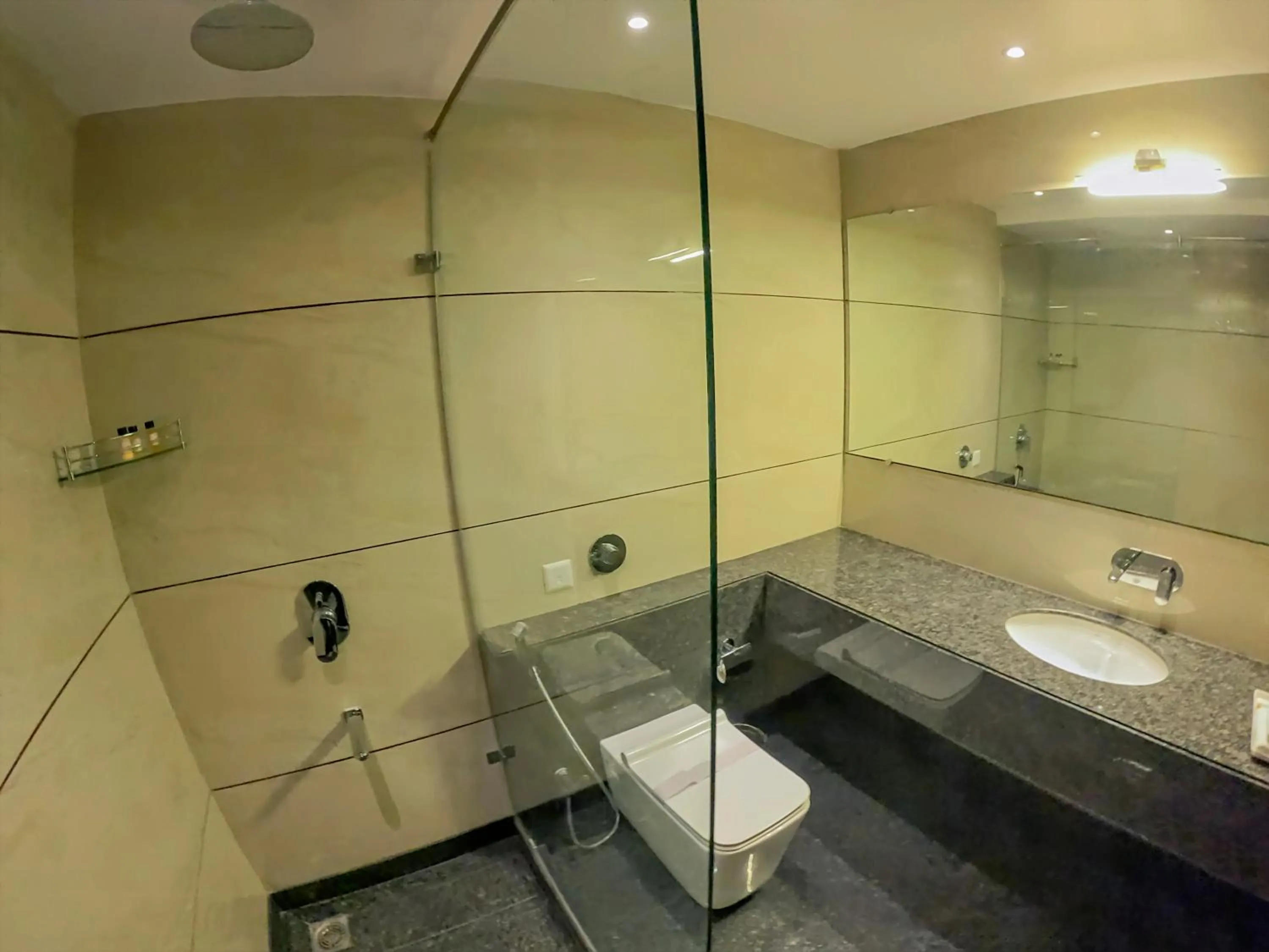 Bathroom in Hotel Hira Inn-10mins From Railway Station & Bus Station