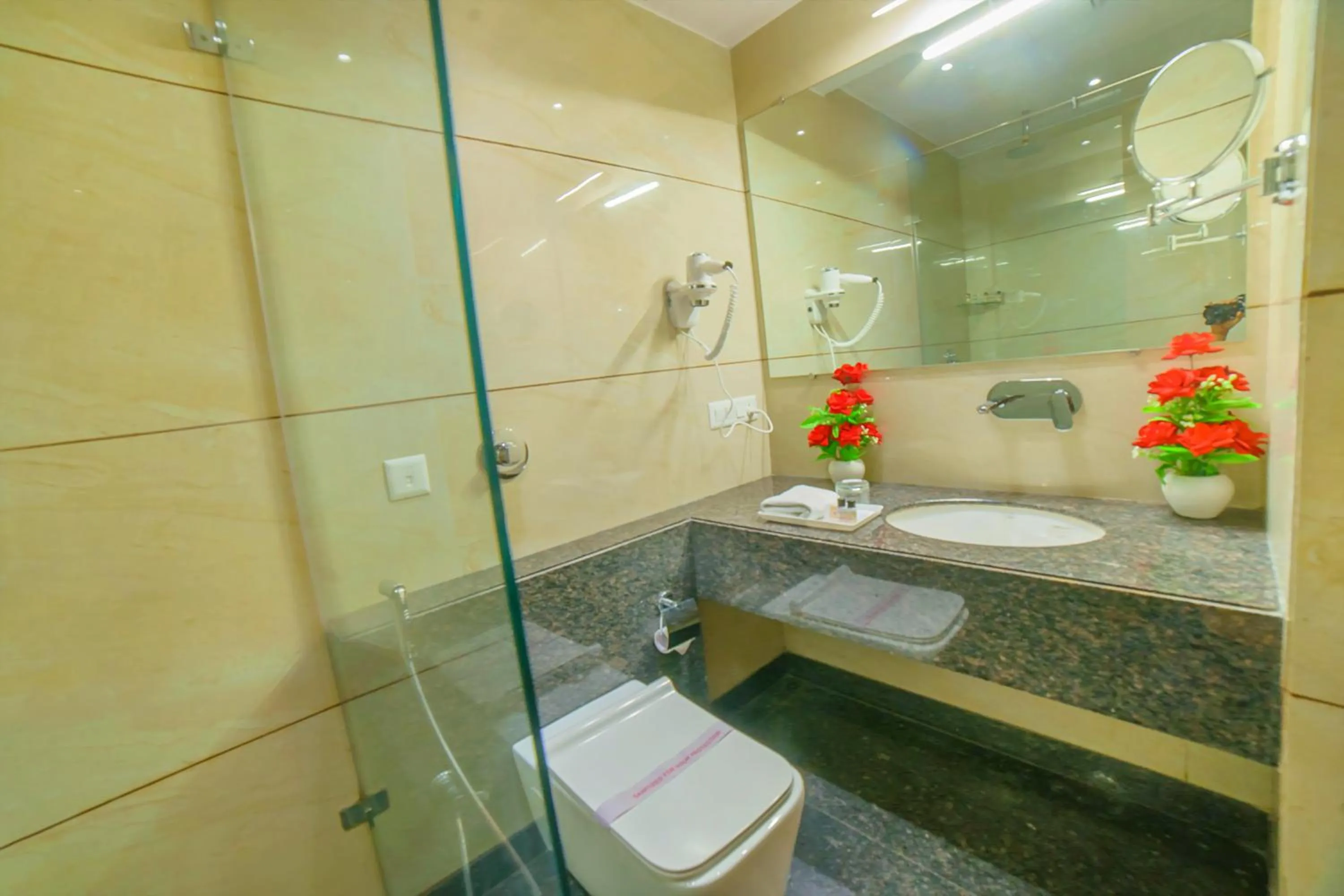 Bathroom in Hotel Hira Inn-10mins From Railway Station & Bus Station