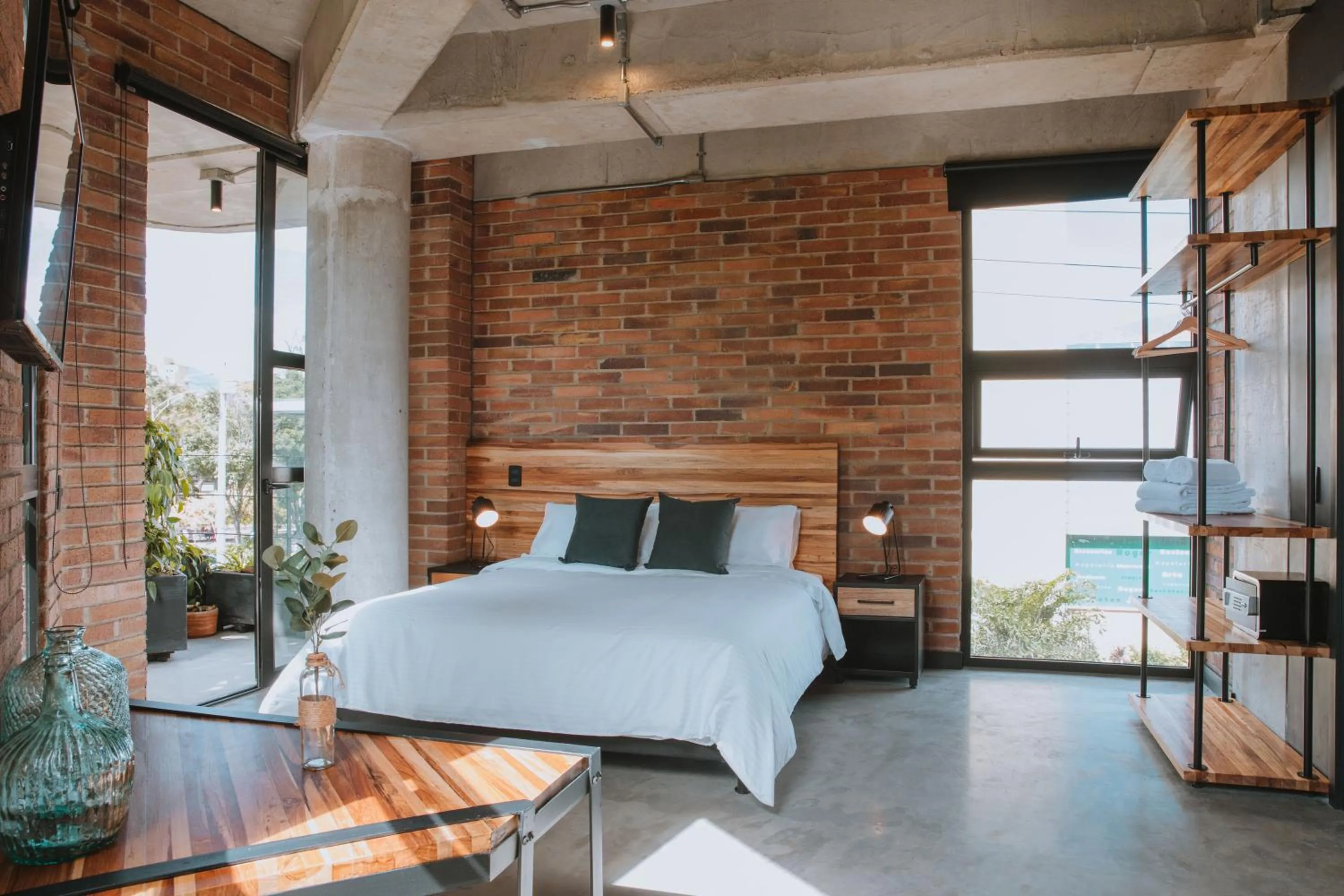 Seating area, Bed in Hotel 3450 Living Lofts