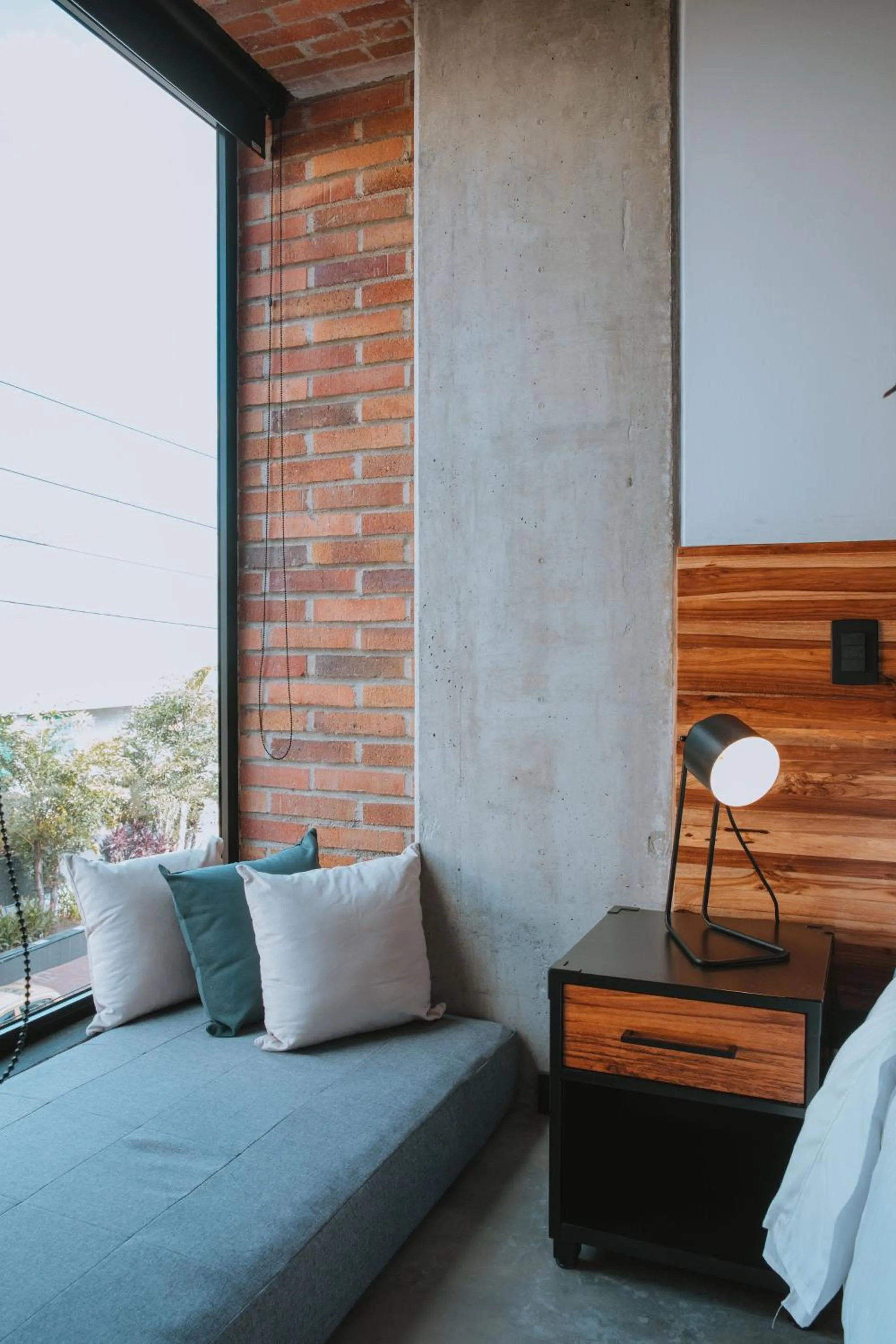 Seating area, Bed in Hotel 3450 Living Lofts