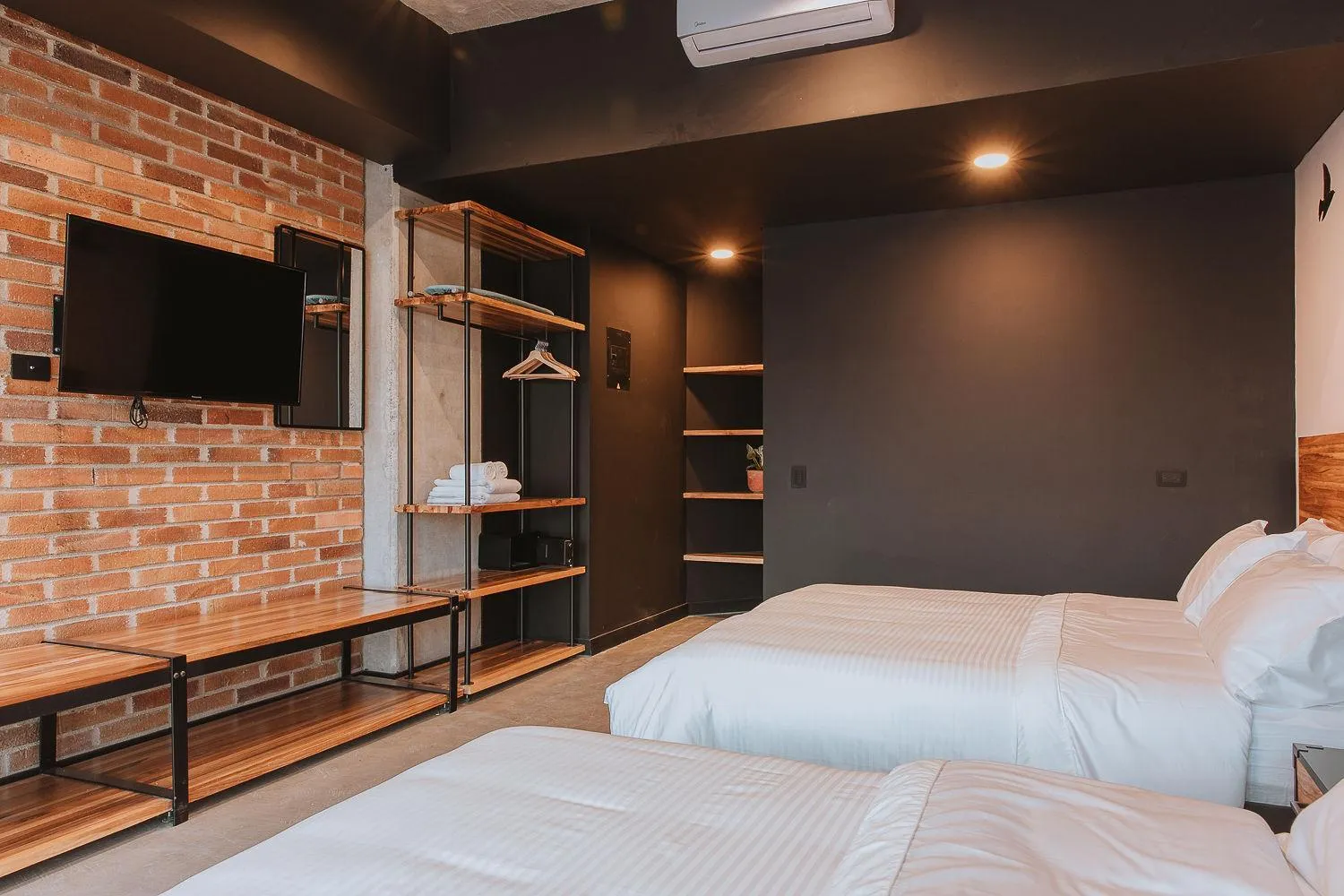 Communal lounge/ TV room, Bed in Hotel 3450 Living Lofts