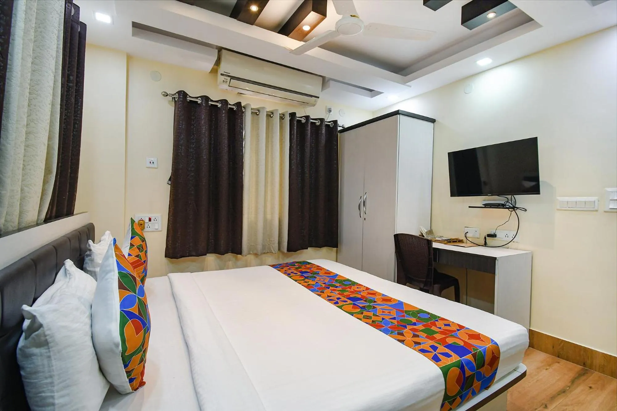 Bed in FabHotel New Annapurna Plaza - Nr Axis Mall