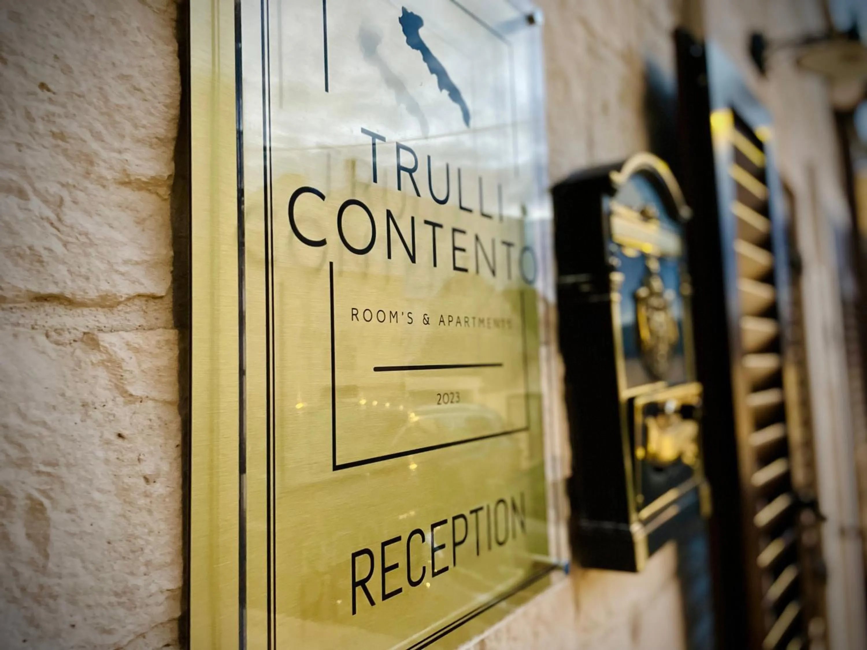 Property logo or sign in Trulli Contento - Rooms & Apartments