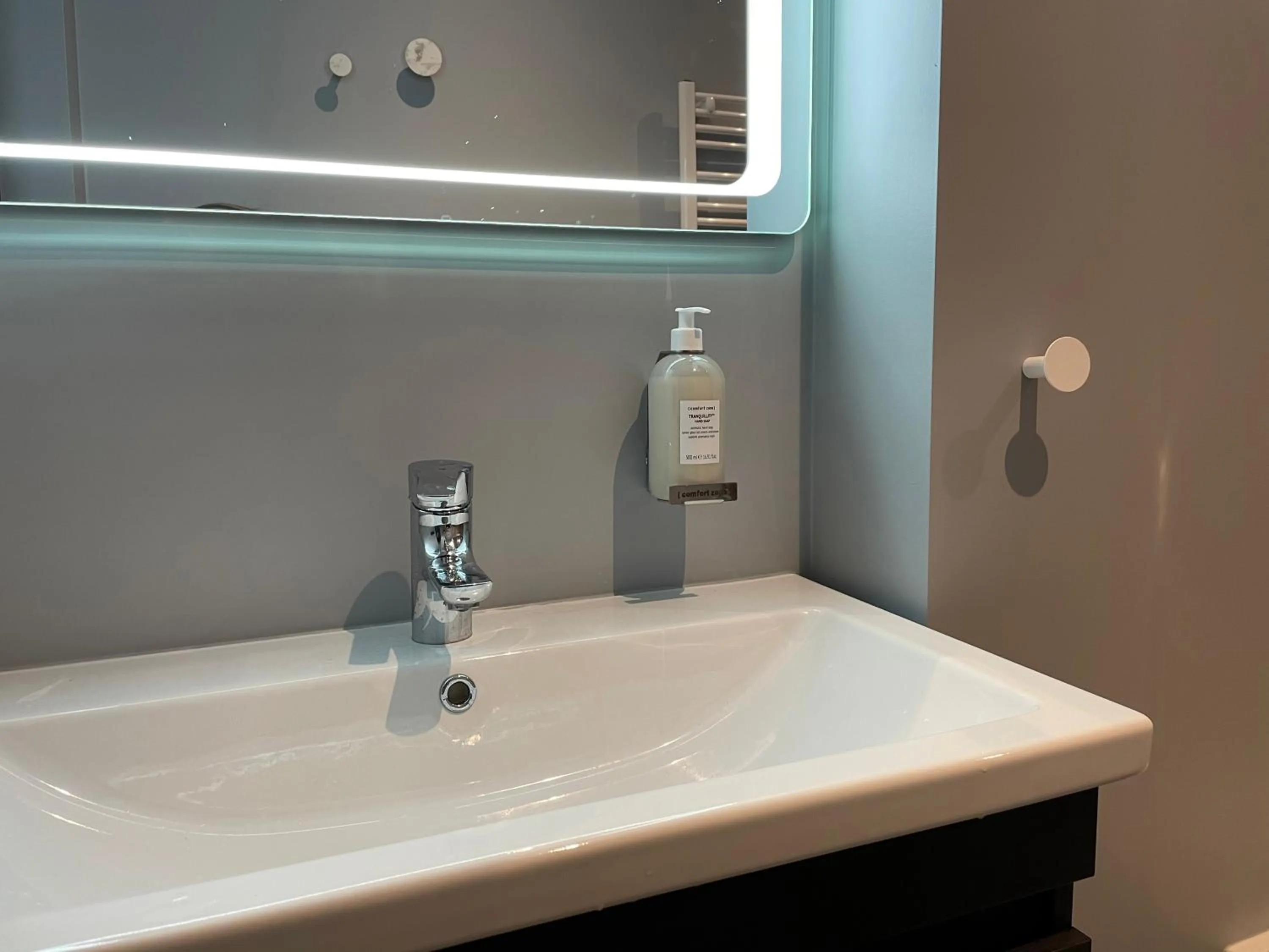 Bathroom in North Apartments Suites