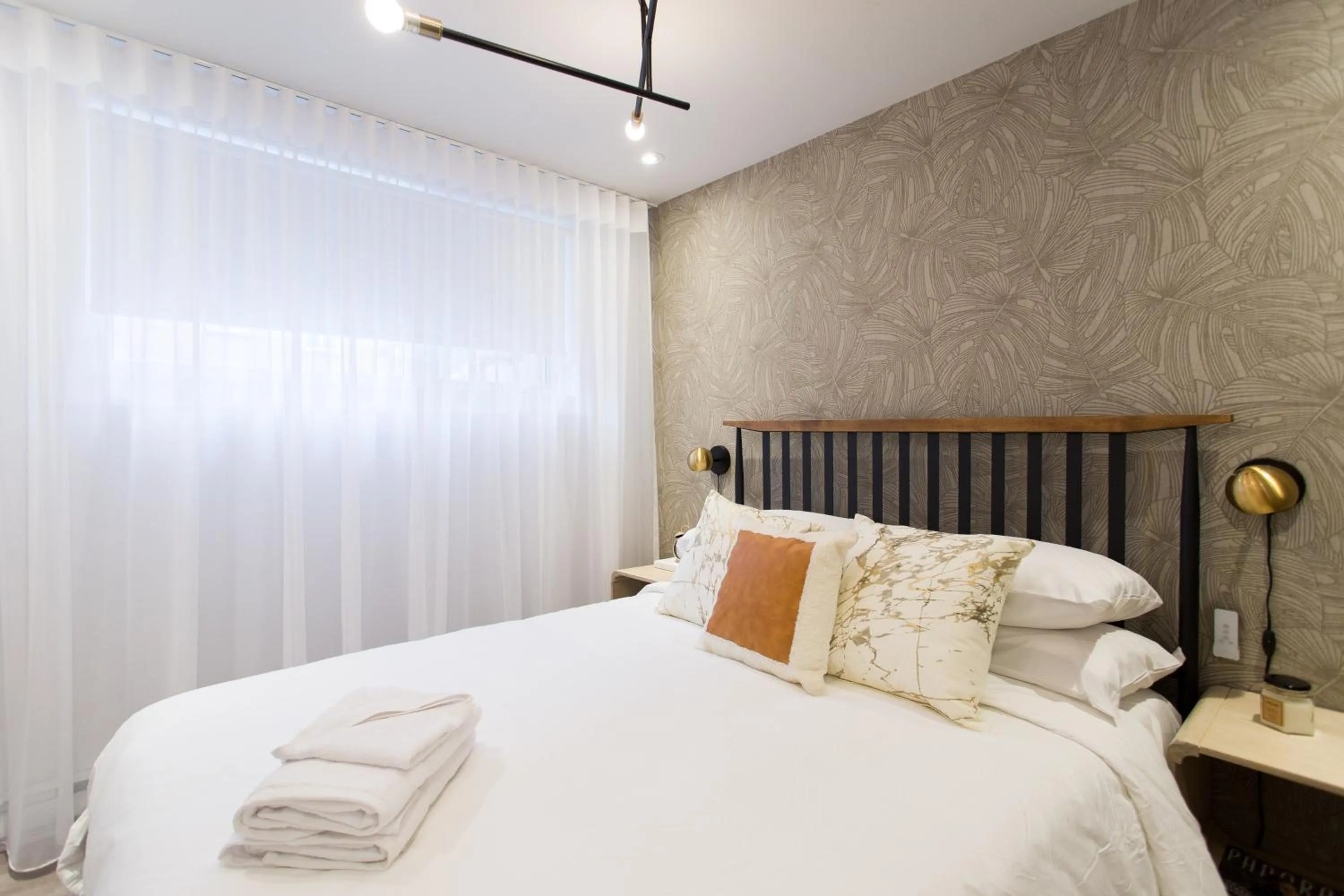 Bed in 16 Studio Apartment-Hotel in Little Italy by Den Stays