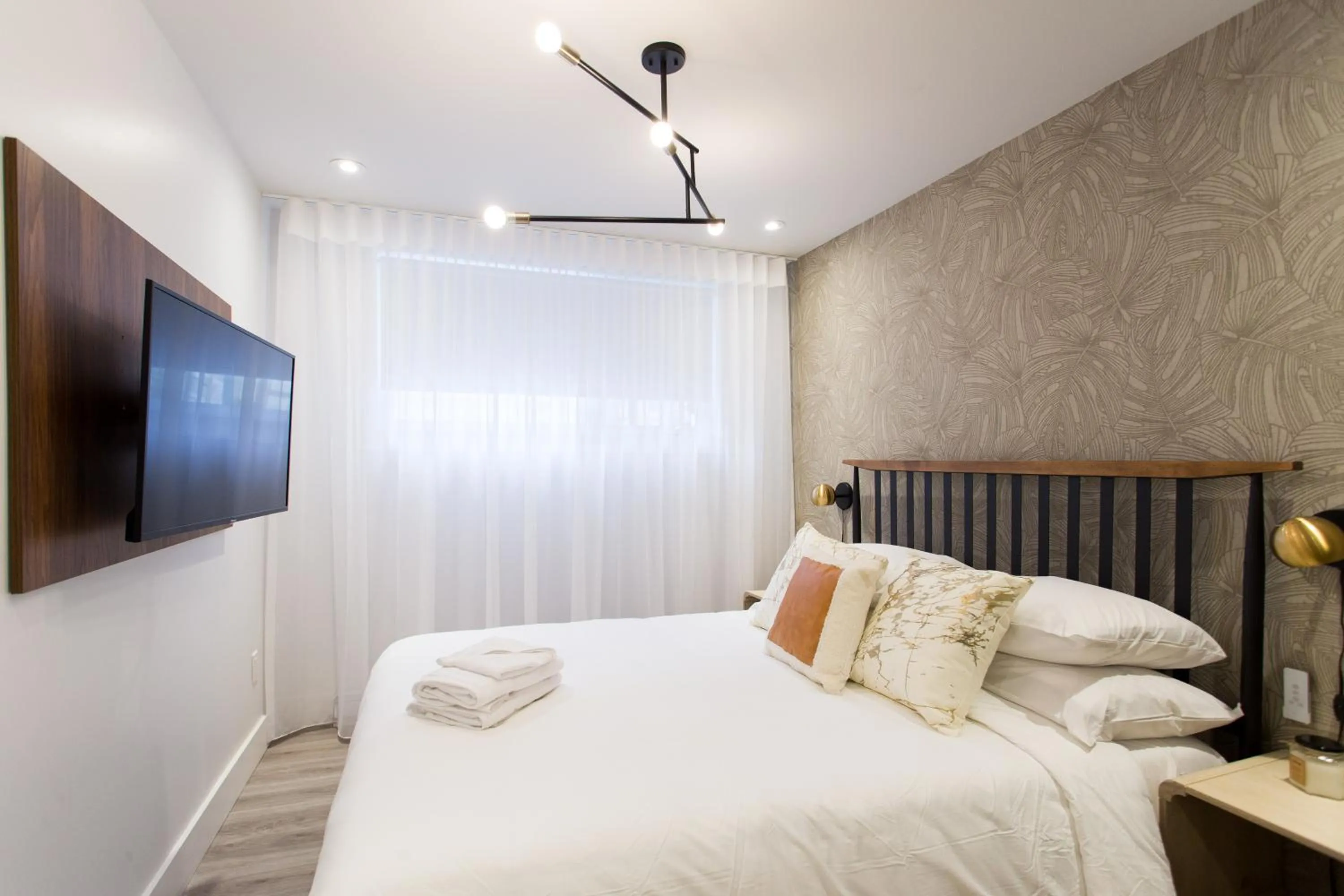 Bed in 16 Studio Apartment-Hotel in Little Italy by Den Stays