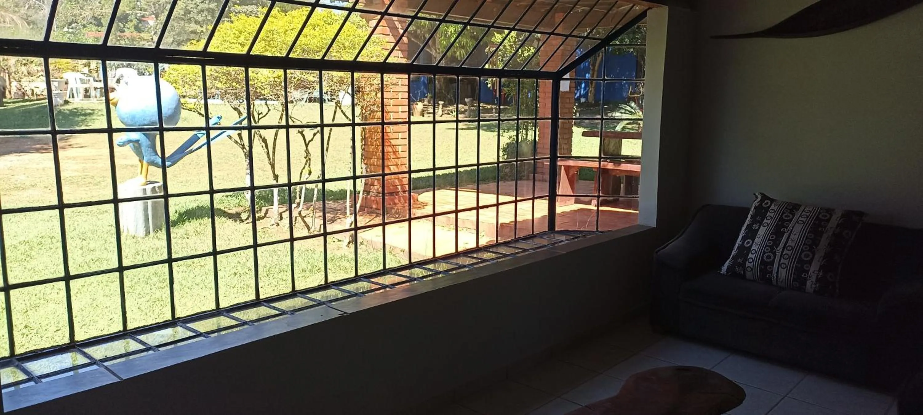 Communal lounge/ TV room in Pousada Canto dos Passaros