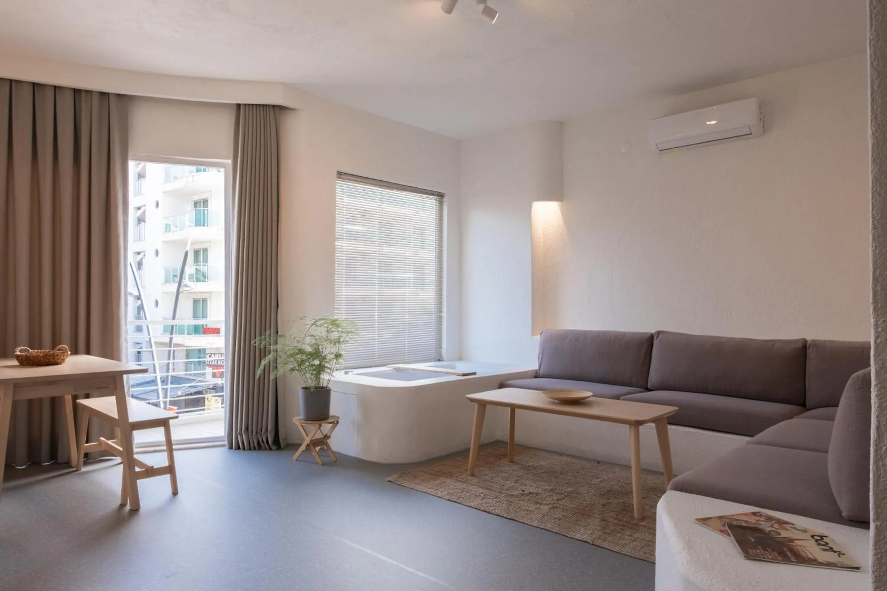 Living room in L'olive homes