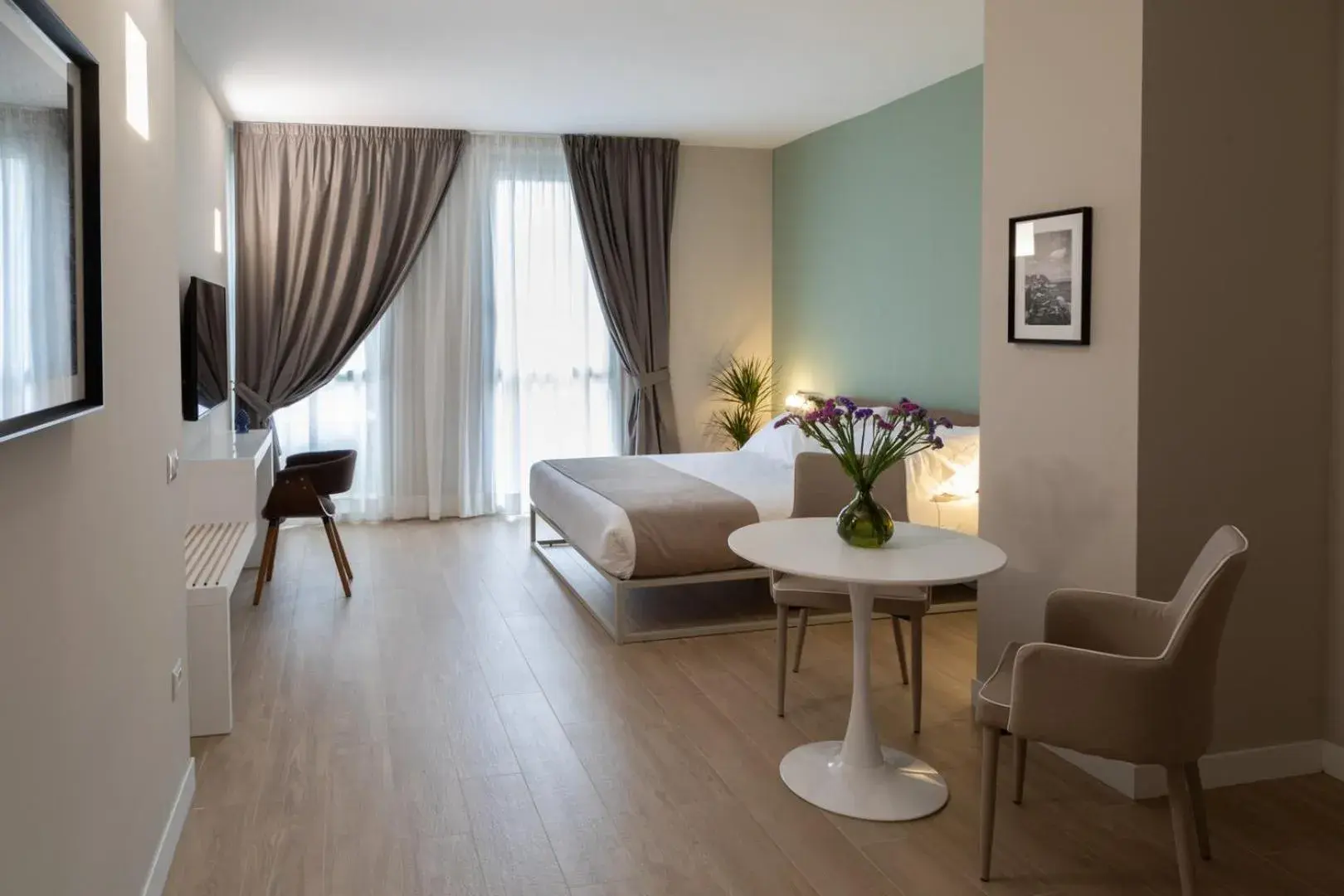 Superior Quadruple Room in Alma Suites Superior Quadruple Room in Alma Suites