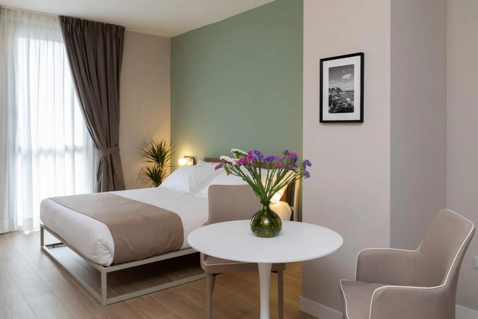 Living room, Bed in Alma Suites