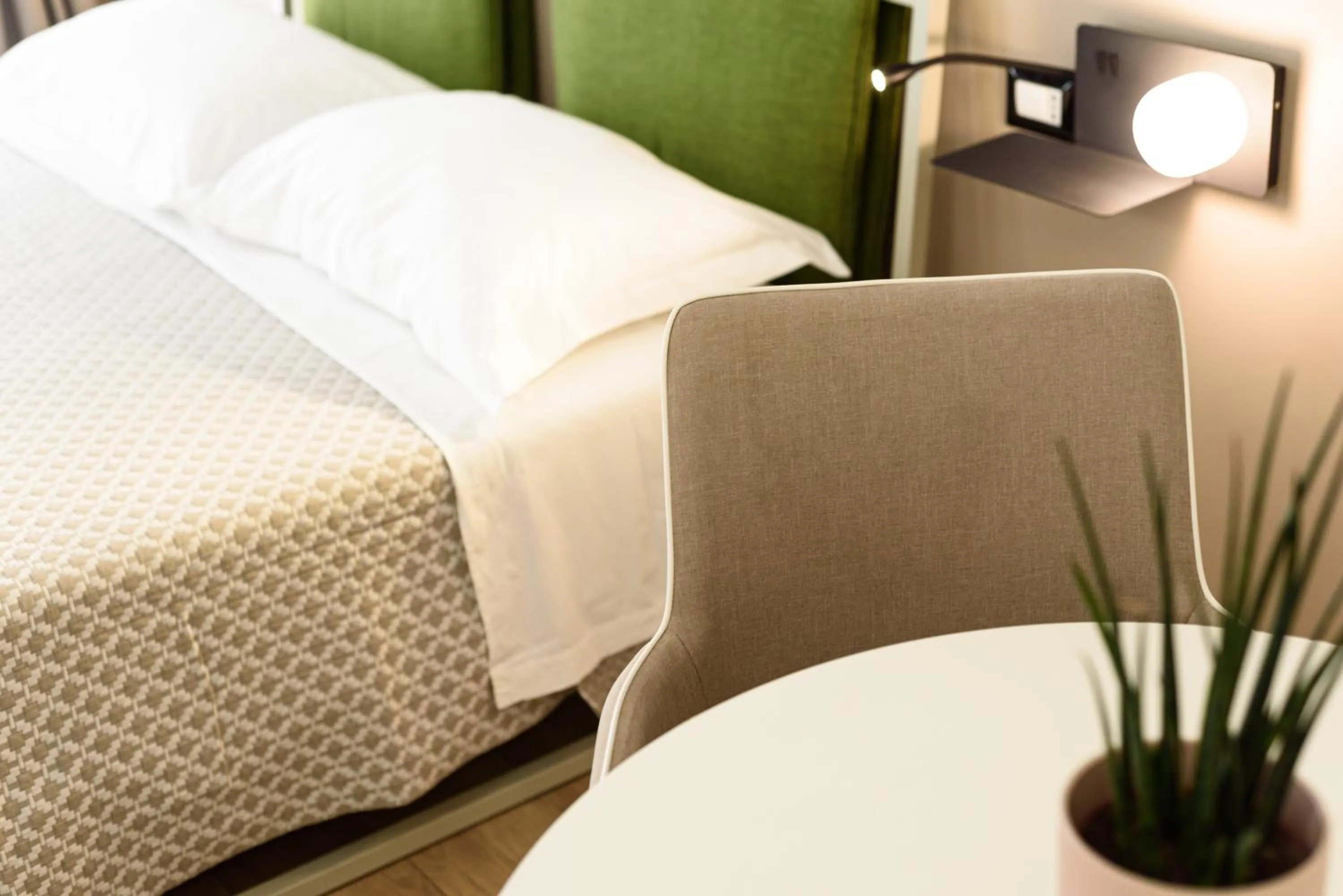 Photo of the whole room, Bed in Alma Suites