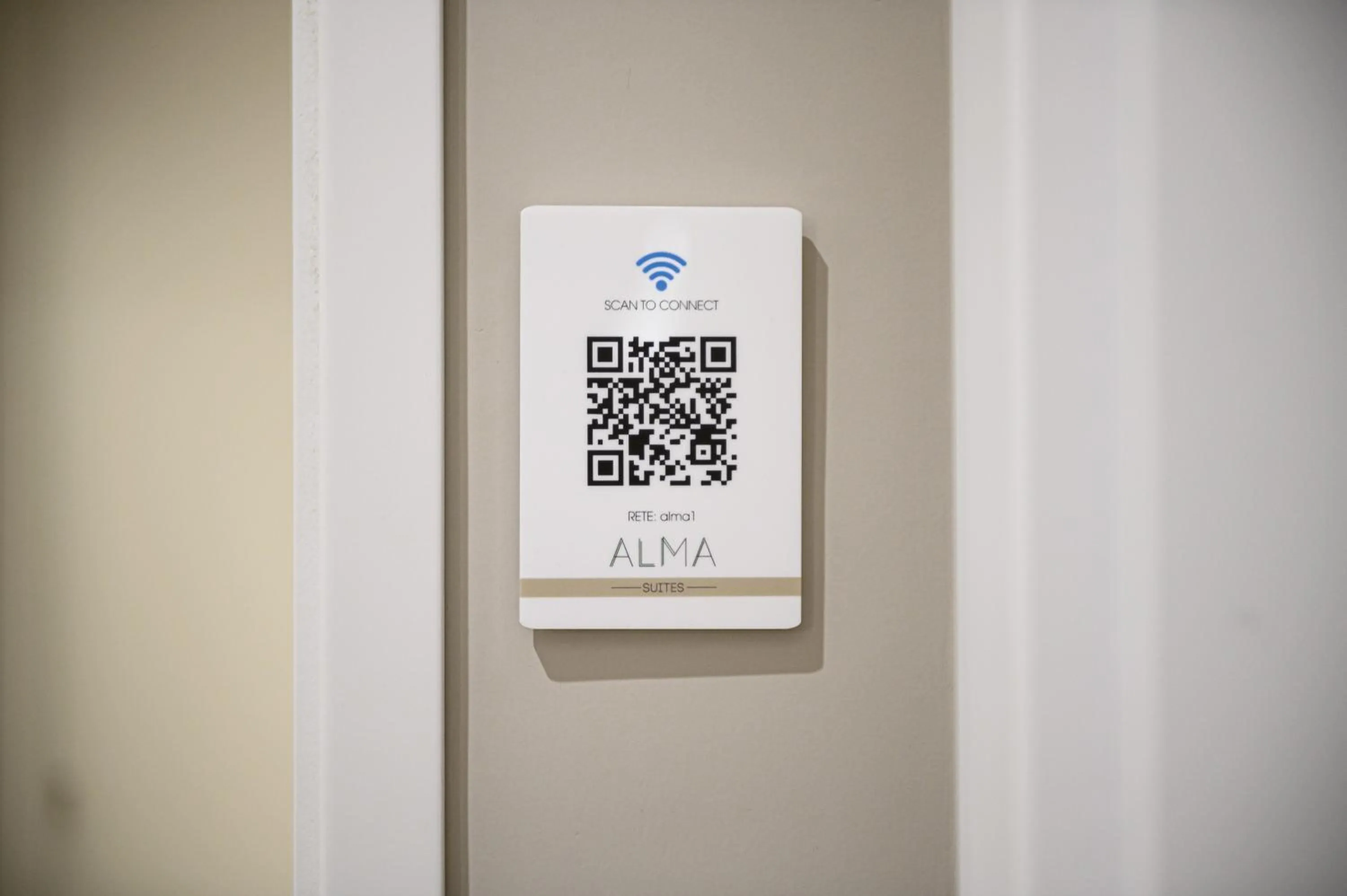 Property logo or sign in Alma Suites