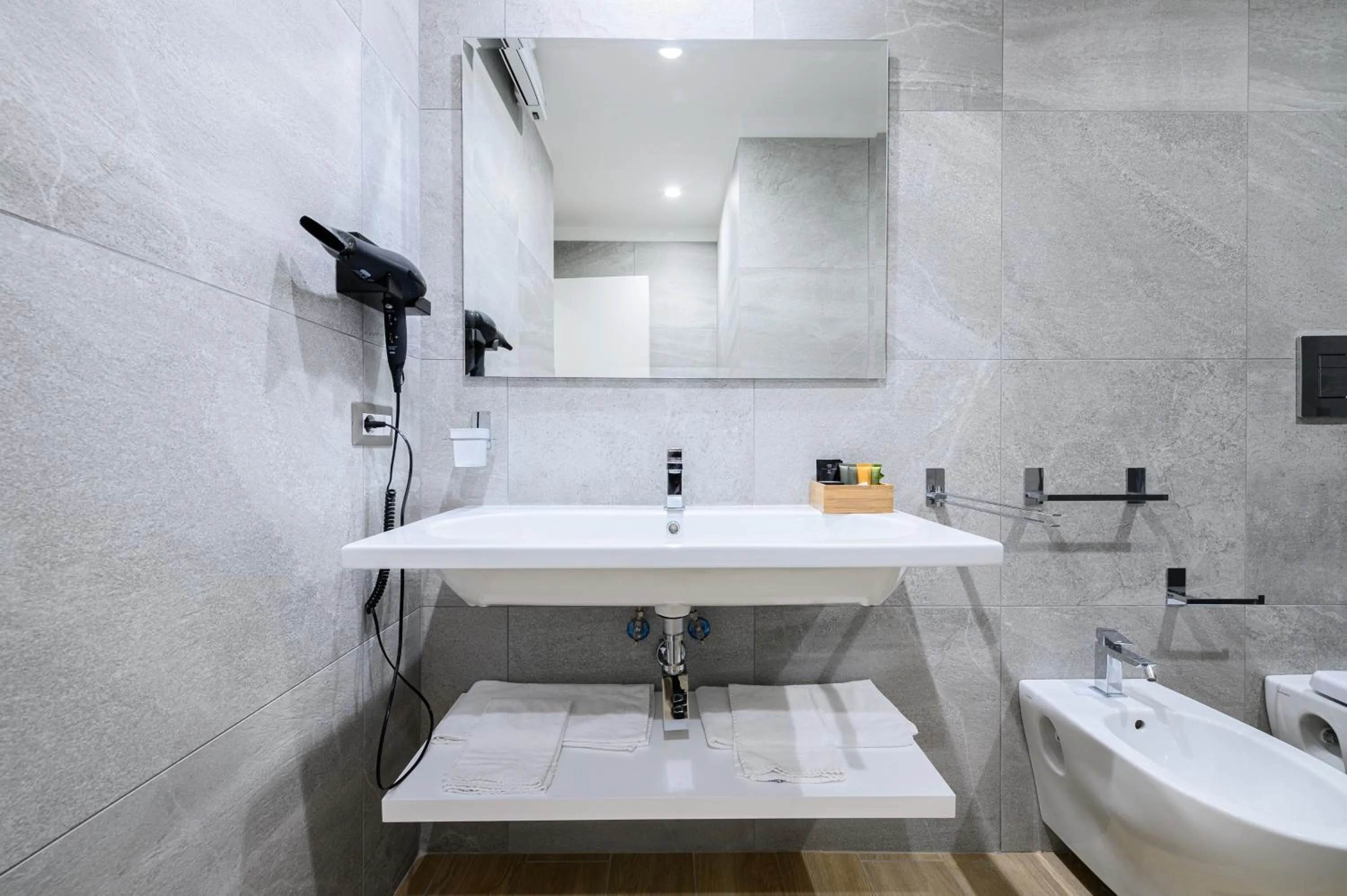 Toilet in Alma Suites