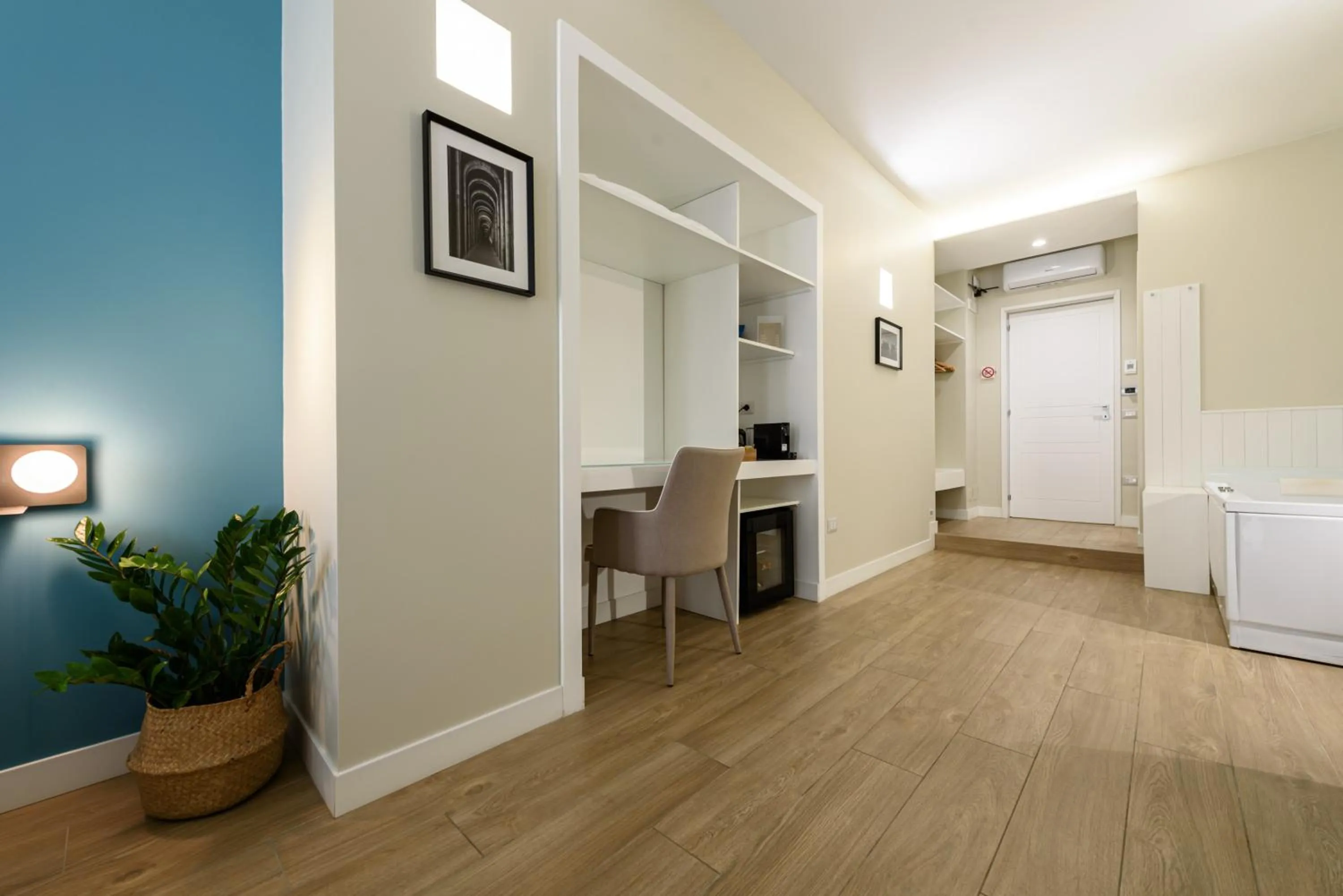 Living room, Bed in Alma Suites