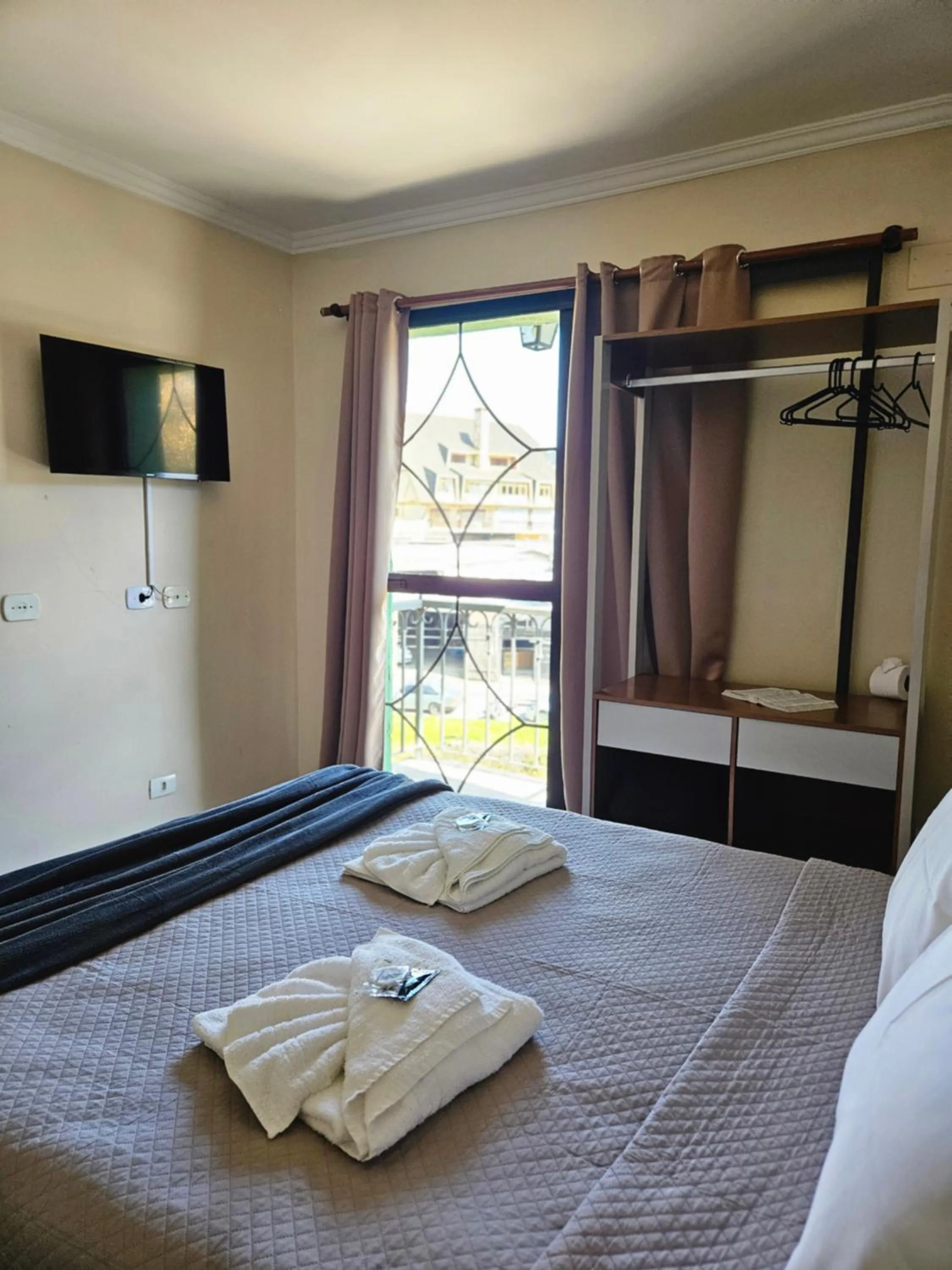 Bed in Pousada Araucária