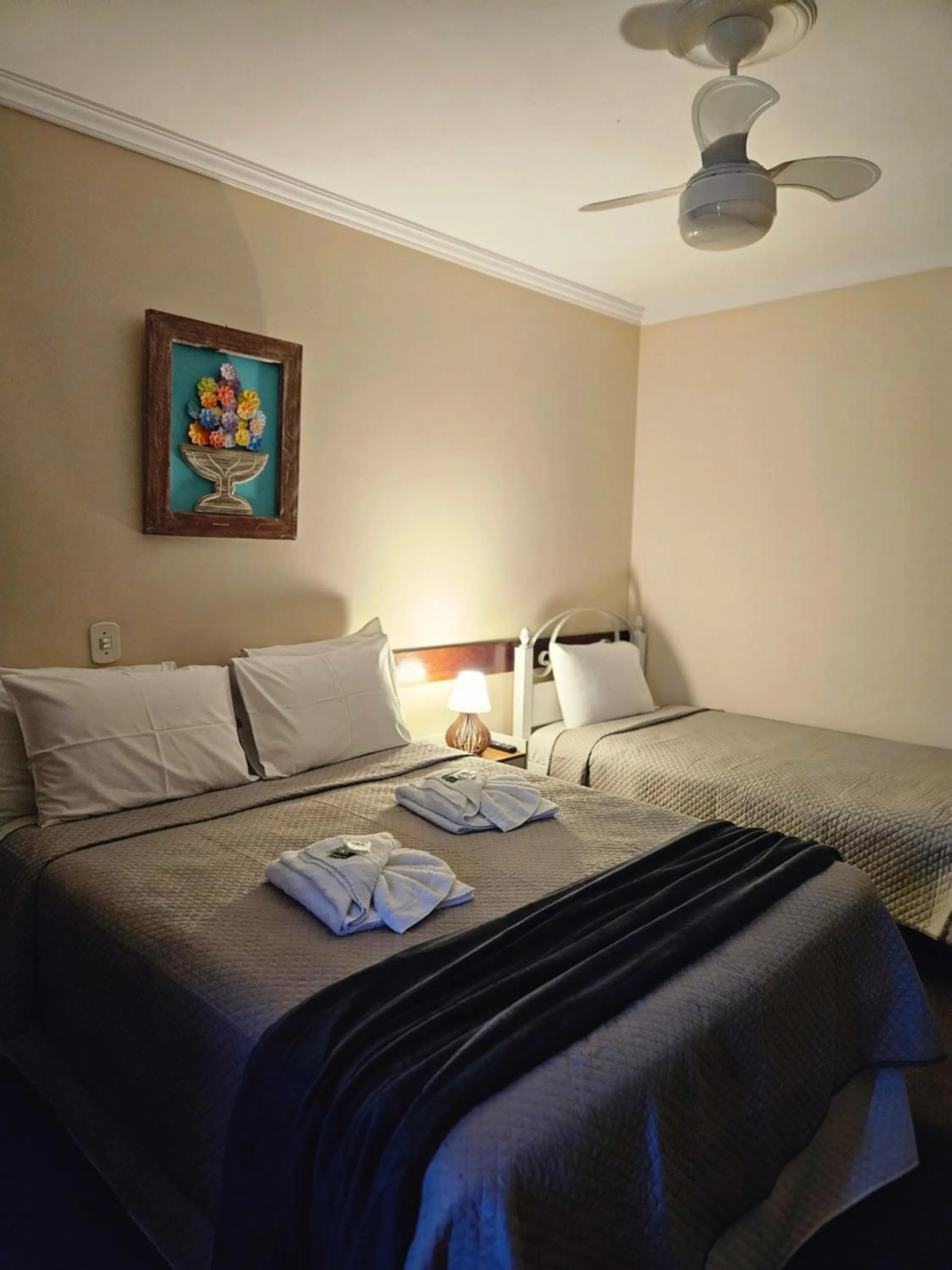 Bed in Pousada Araucária