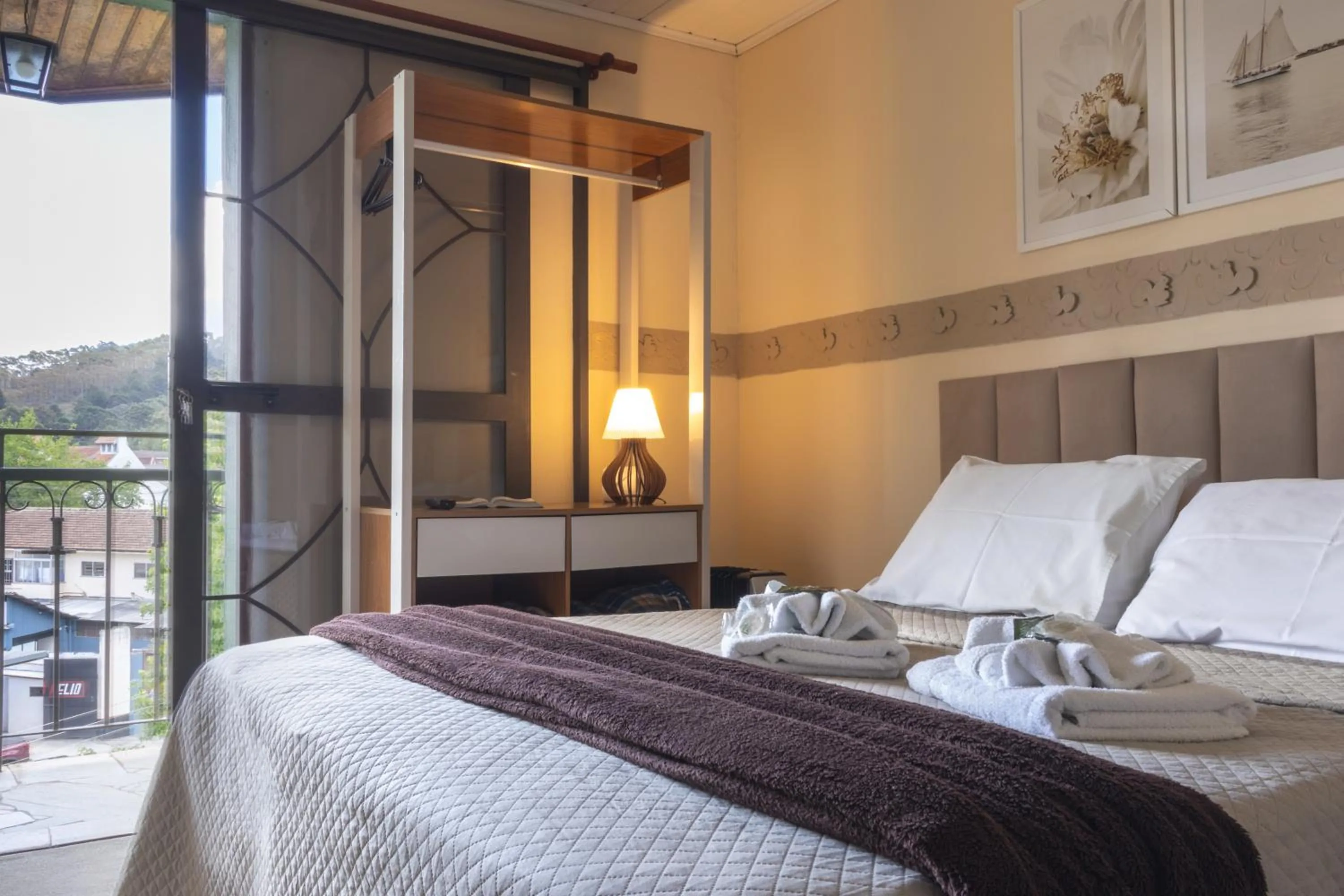 Bed in Pousada Araucária