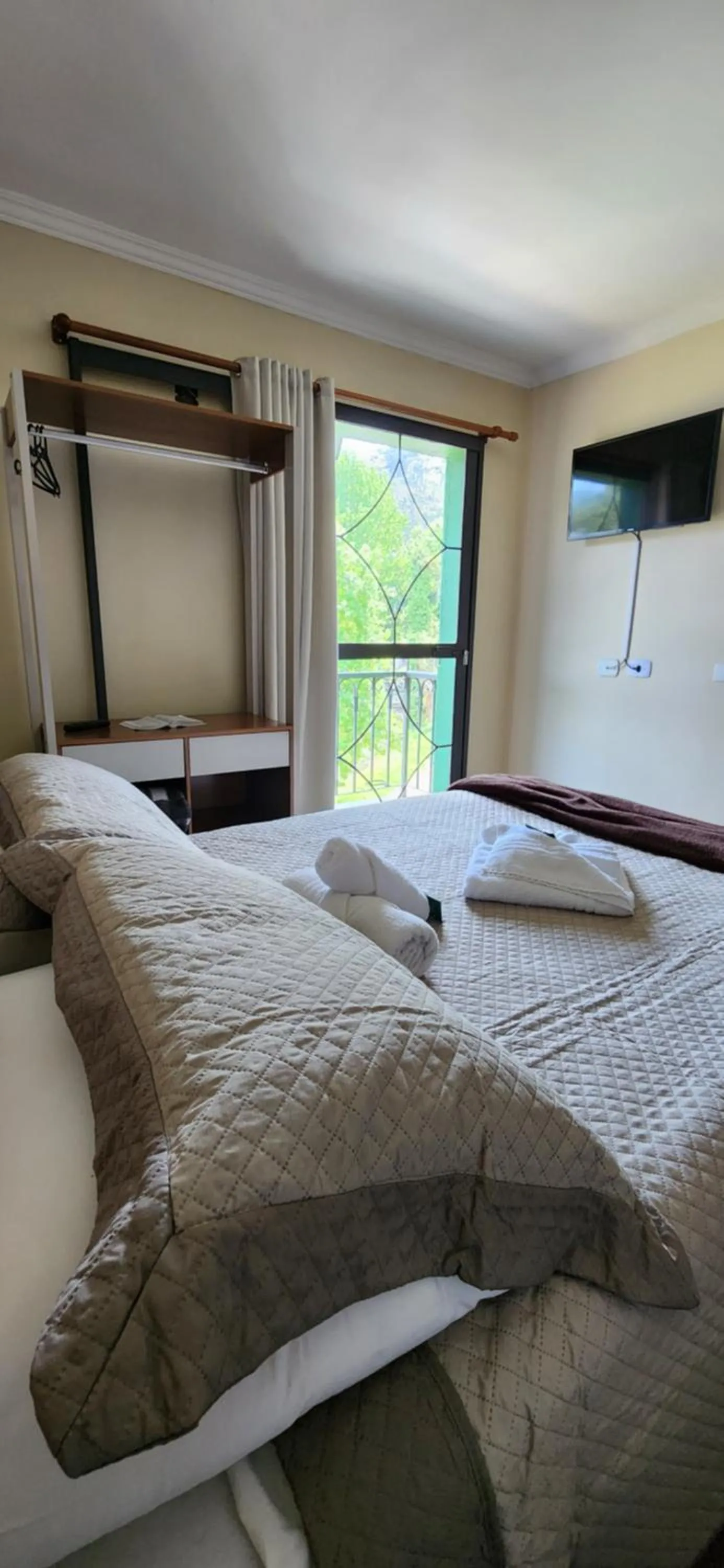 Bed in Pousada Araucária