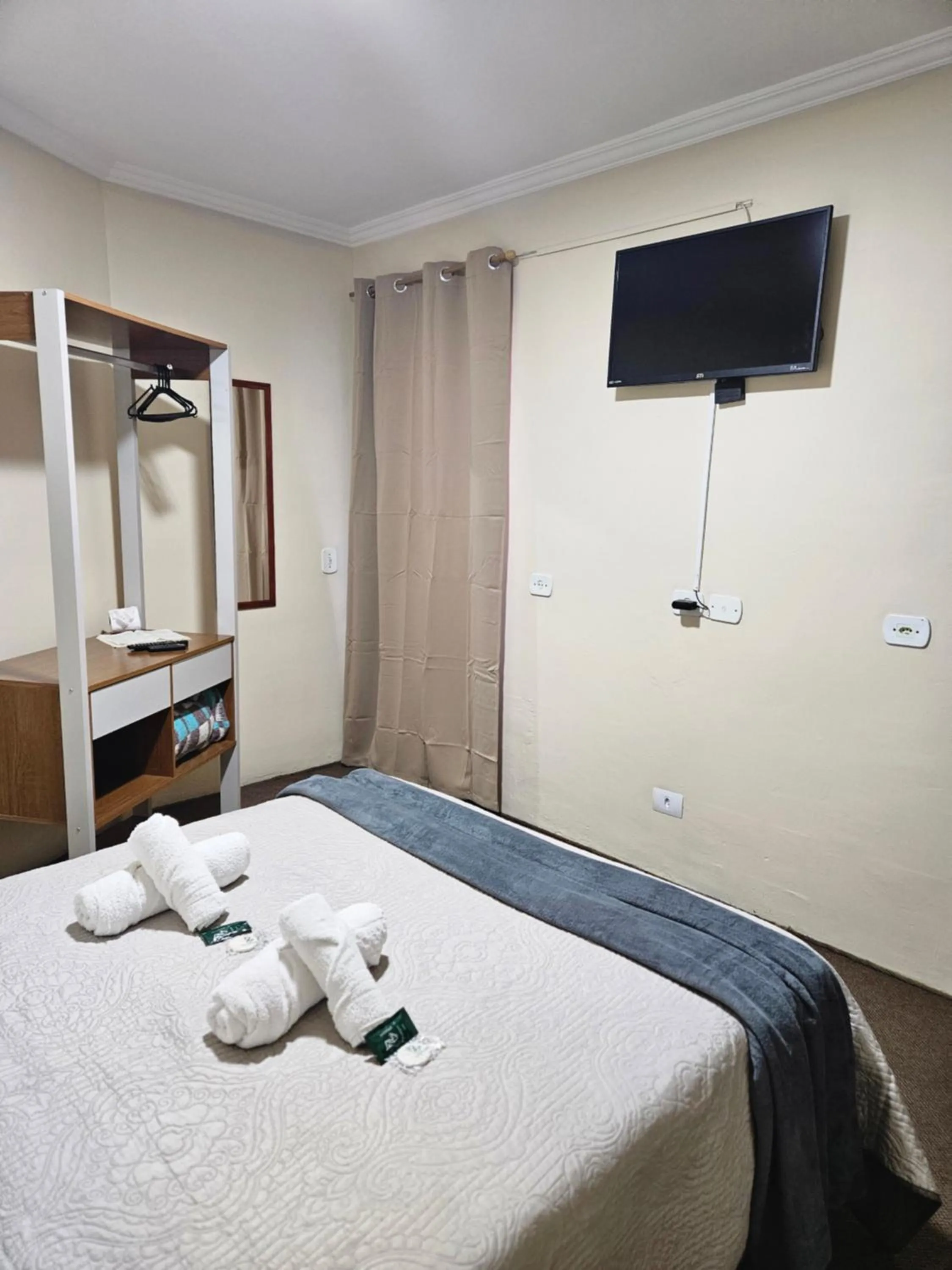 Bed in Pousada Araucária