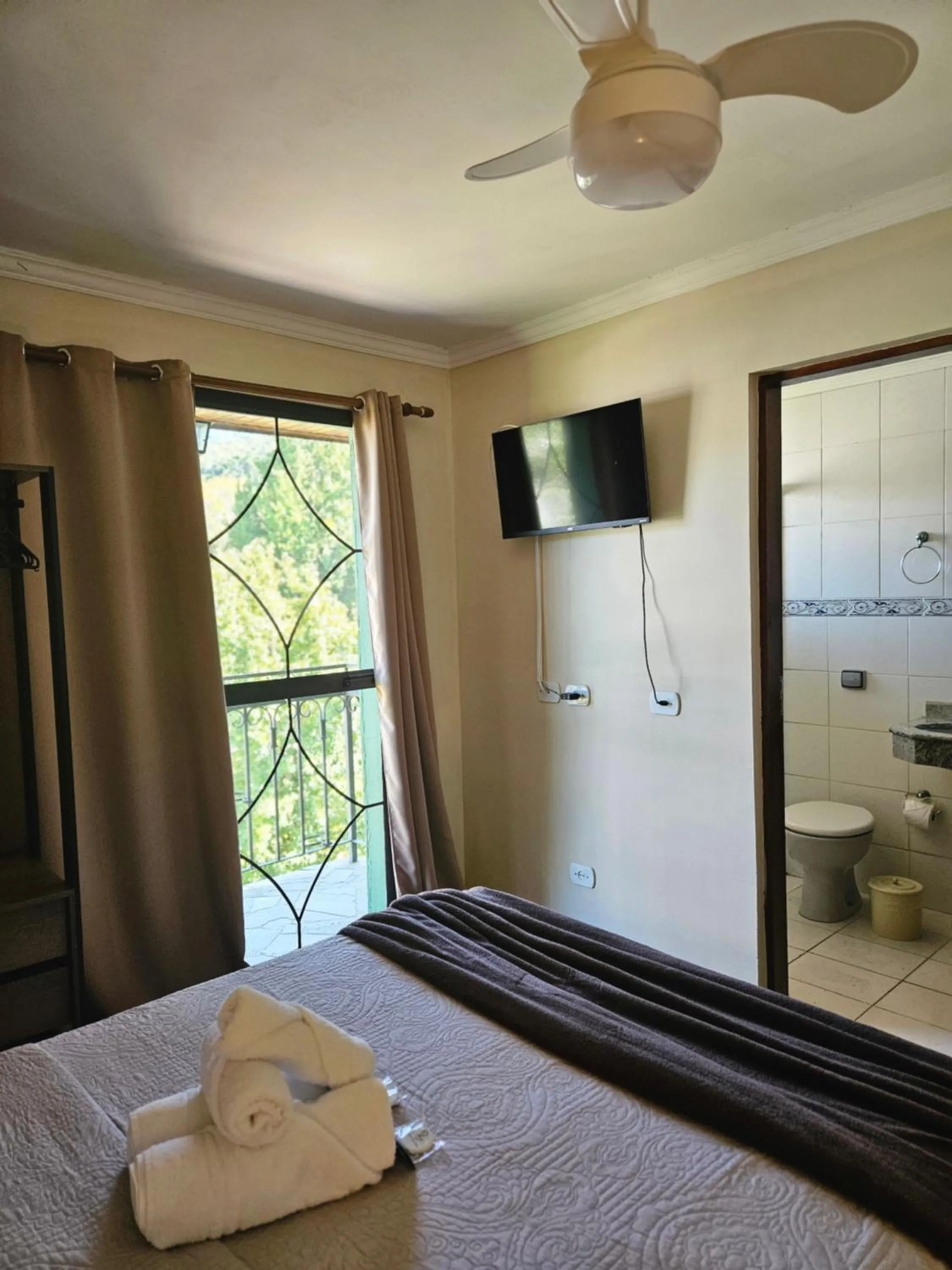 Bed in Pousada Araucária