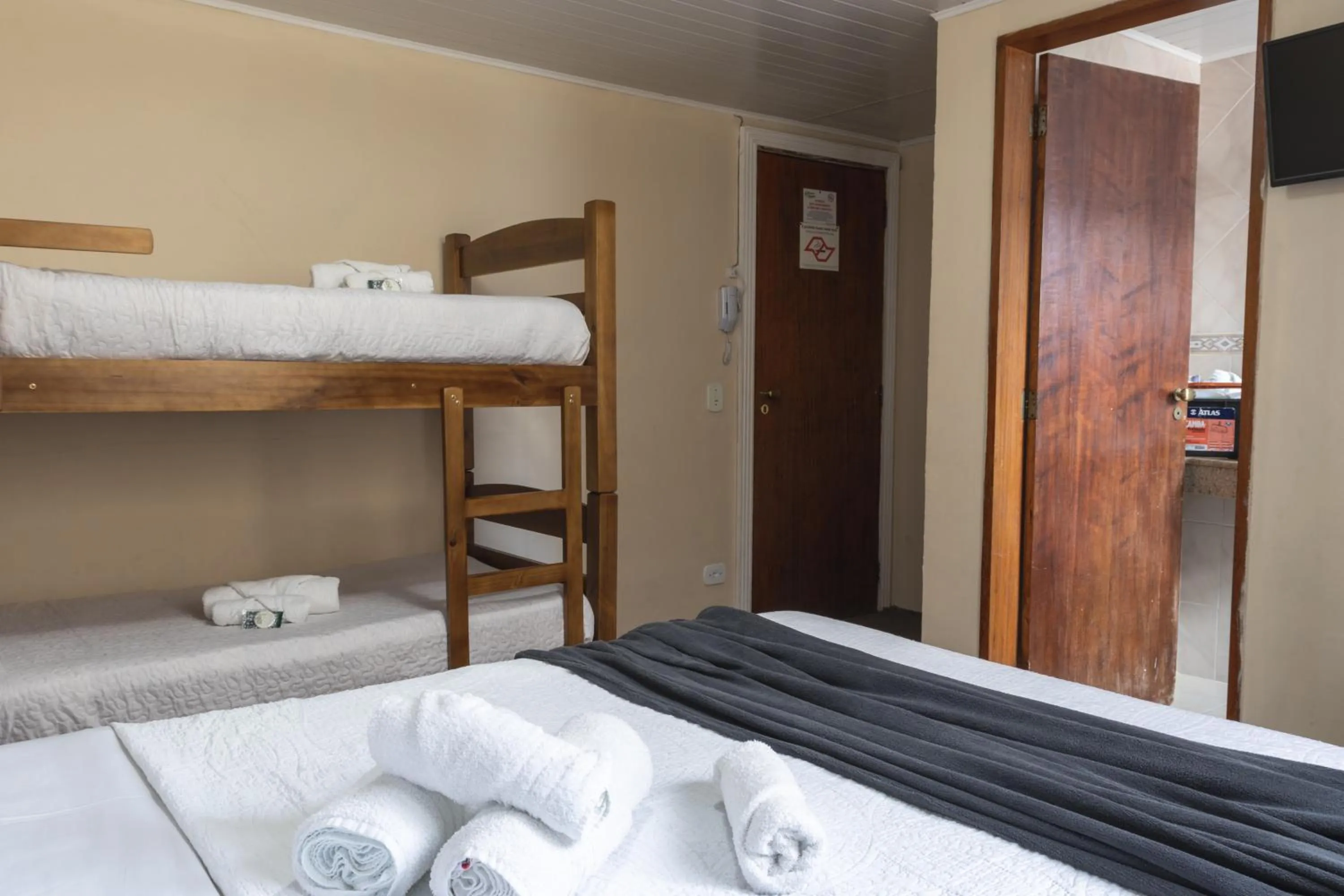 Bed in Pousada Araucária