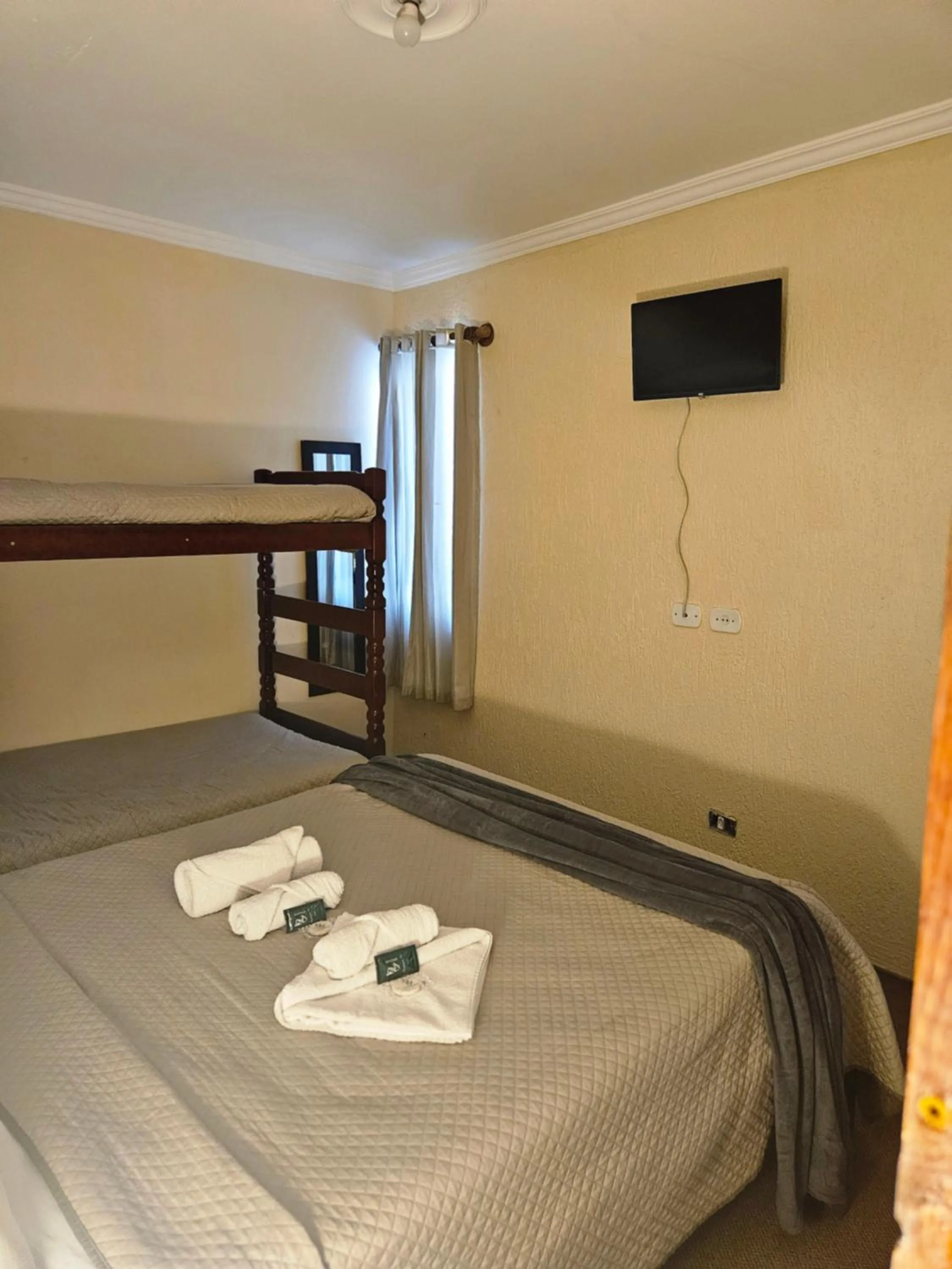 Bed in Pousada Araucária