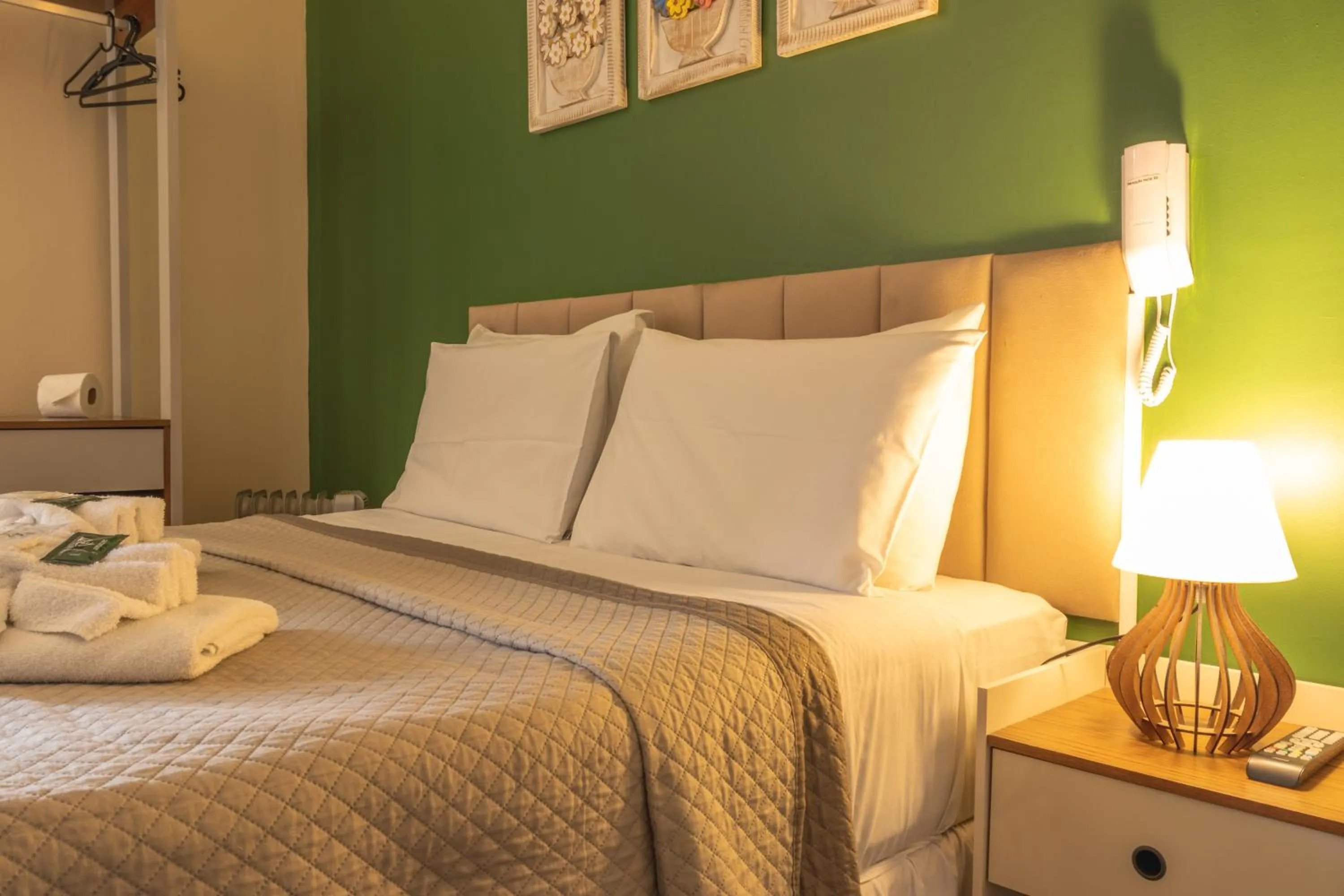 Bed in Pousada Araucária