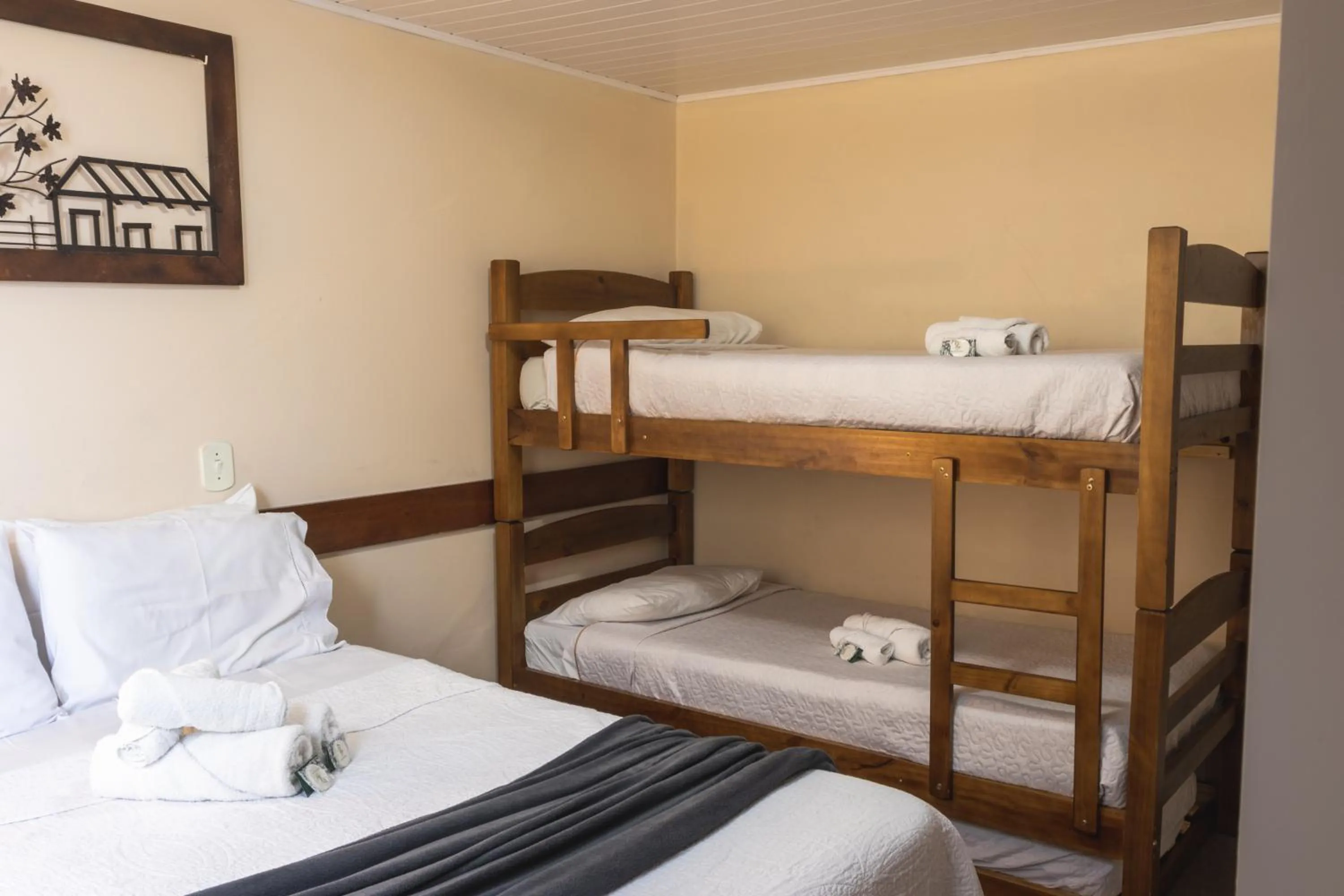 Bed in Pousada Araucária