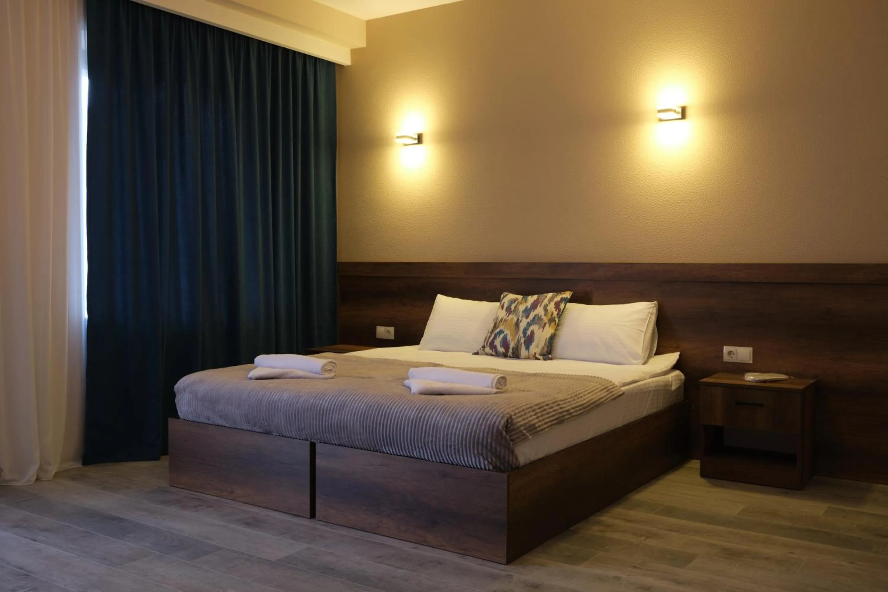 Bed in Hotel Axien Kazbegi