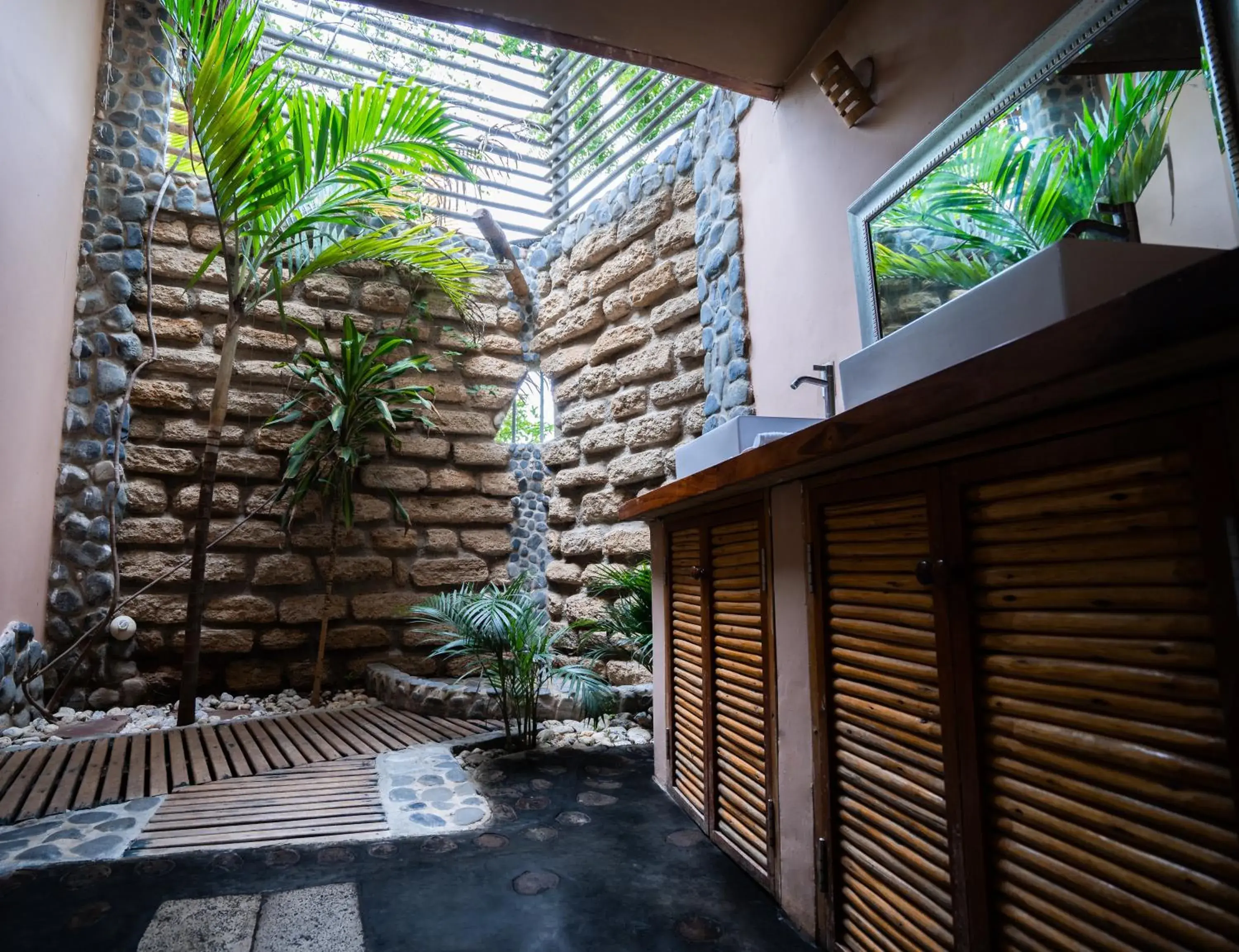 Twin Room with Two Double Beds with Garden View in Villa Del Sol Twin Room with Two Double Beds with Garden View in Villa Del Sol