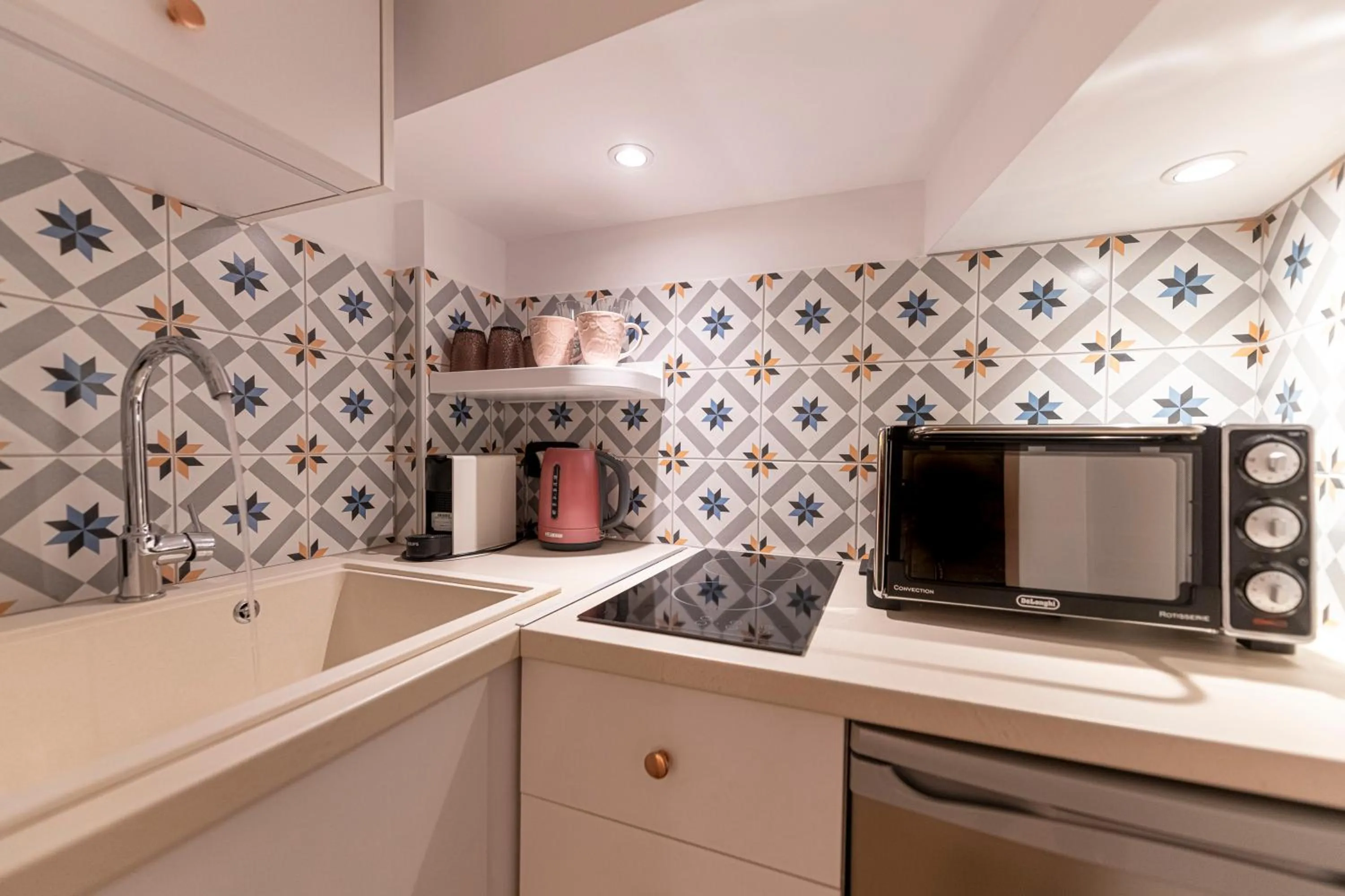 Kitchen or kitchenette in IPELHOME - Rodi Boutique Apartment