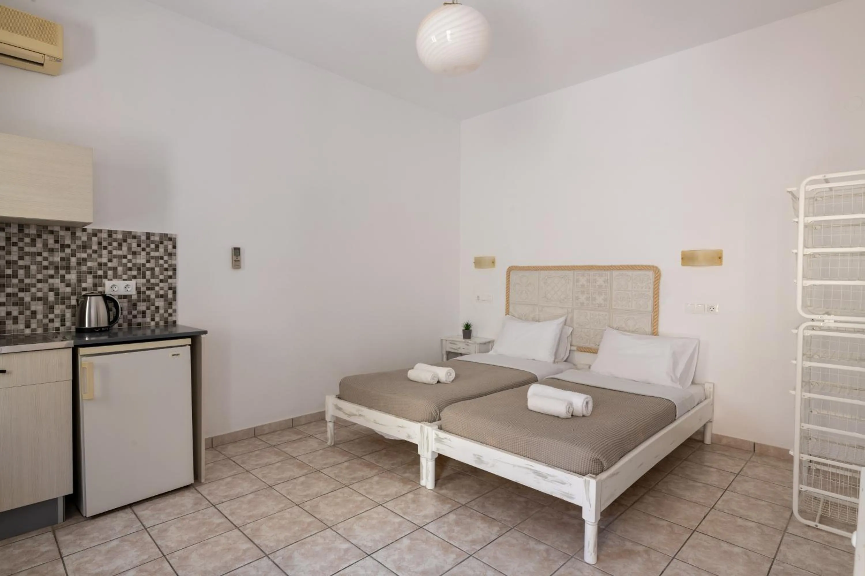 Bed in Pefkos View Apartments