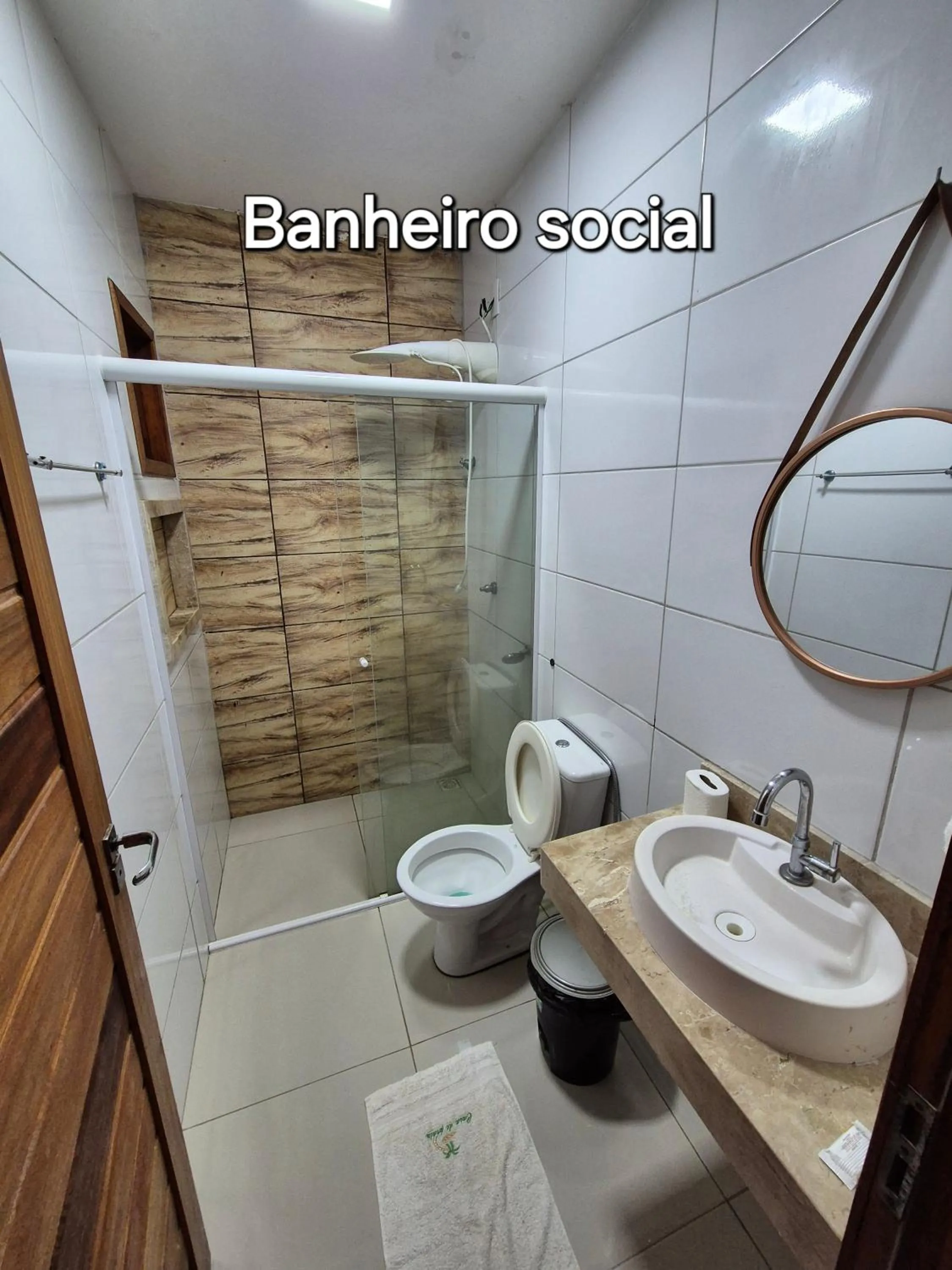 Bathroom in Casa na praia com vista para o mar