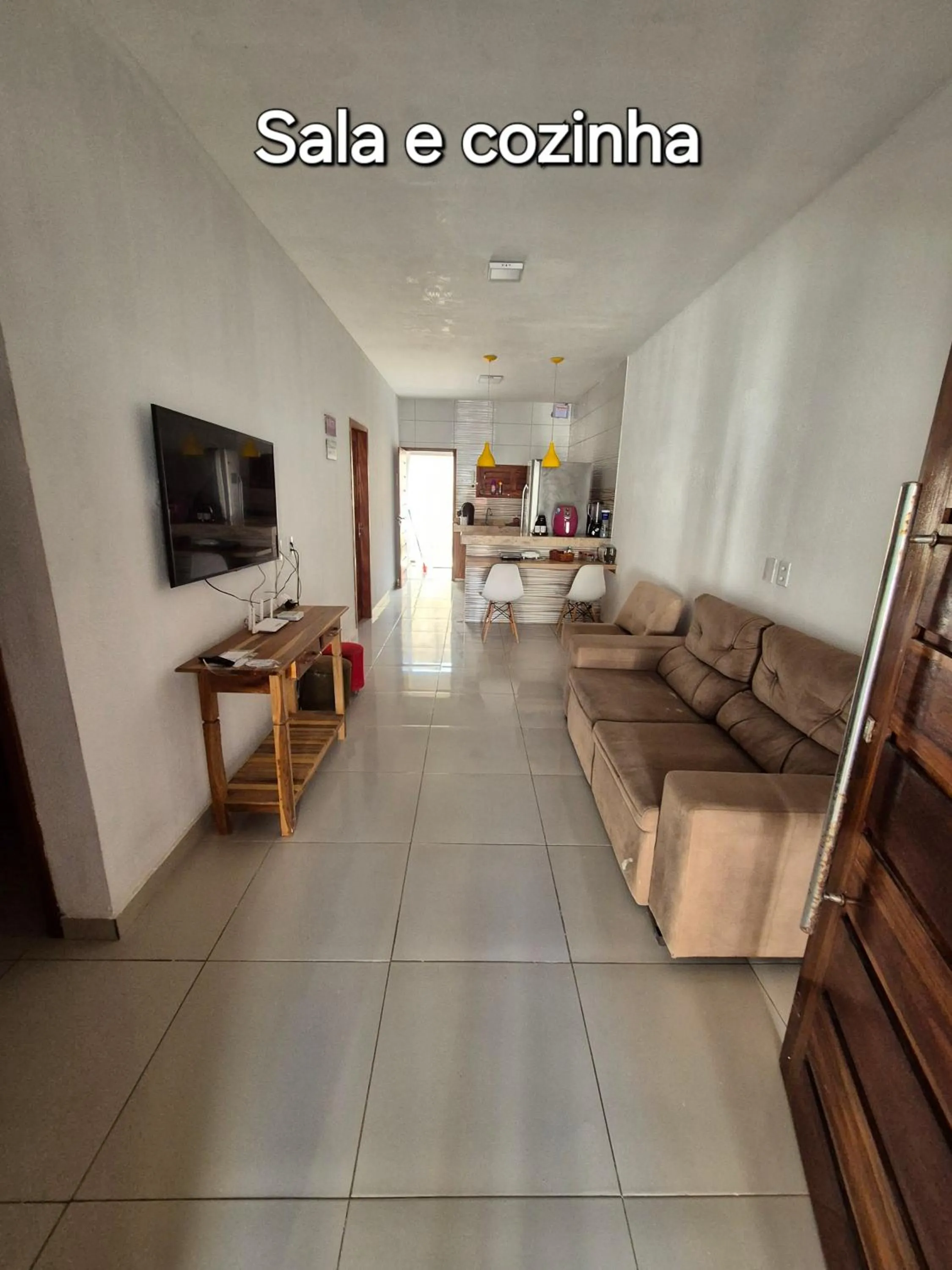 Living room in Casa na praia com vista para o mar