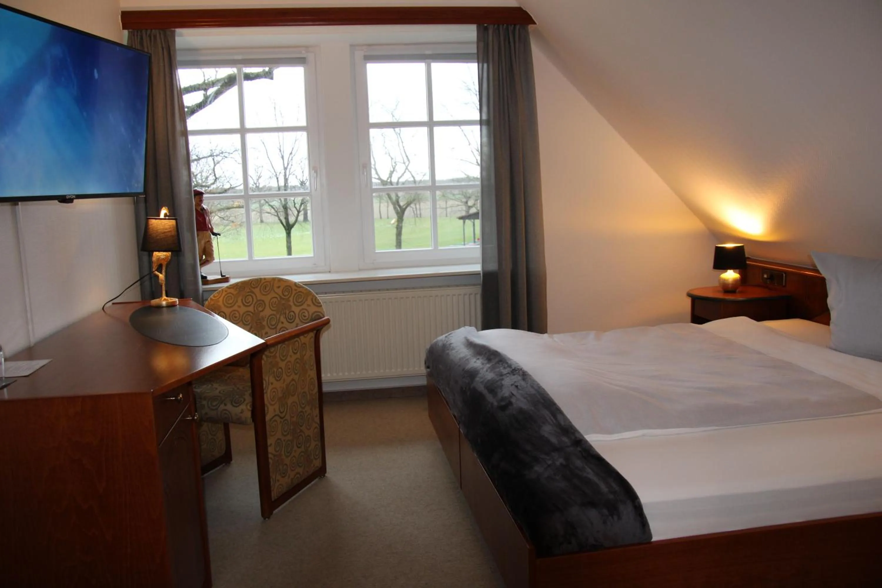 Photo of the whole room, Bed in Landhaus am Golfpark Inhaber Marko Nolden